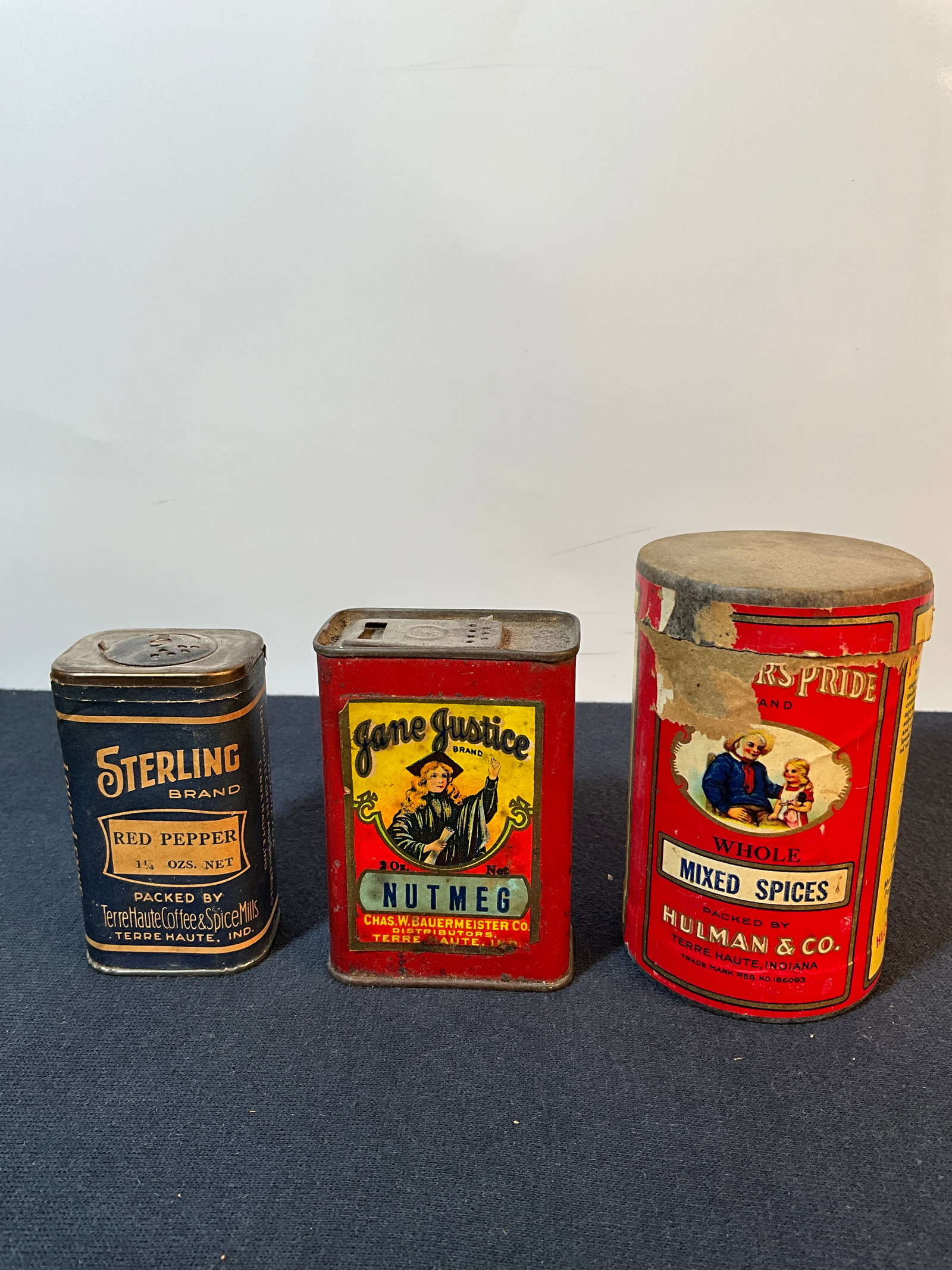 Terre Haute, Ind, Country Store Items-Terre Haute Coffee&Spice Mills, Jane Justice, & Hulman & Co.: In this lot is a collection of three spice containers made in Terre Haute, Indiana. There is a Sterling Brand Red Pepper from the Terre Haute Coffee and Spice Mills, Farmer's Pride Whole Mixed Spices
