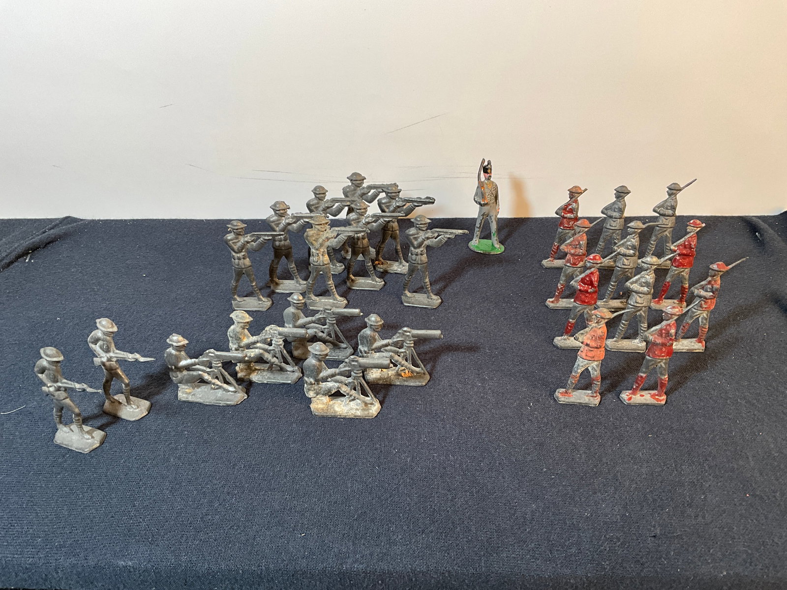 Lot of 27 Cast Lead Military Figurines. Hand Painted, WWII Era Looking - All the Same Style: Lot of 27 Cast Lead Military Figurines. Hand Painted, WWII Era Looking - All the Same Style. There are several different types of military men. WWII or I era type of weapons. This looks to part of the