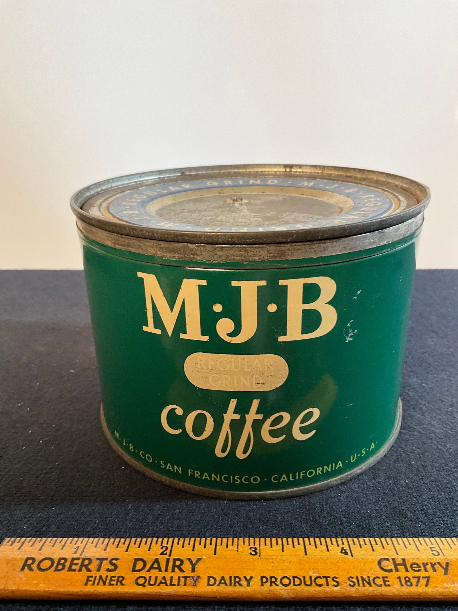 MJB Key Wind Regular Grind Coffee Tin, San Francisco, California: In this lot is a MJB key wind coffee tin out of San Francisco, California. There are somescratches on the side of the coffee tin, but in overall good condition. Please see photographs.