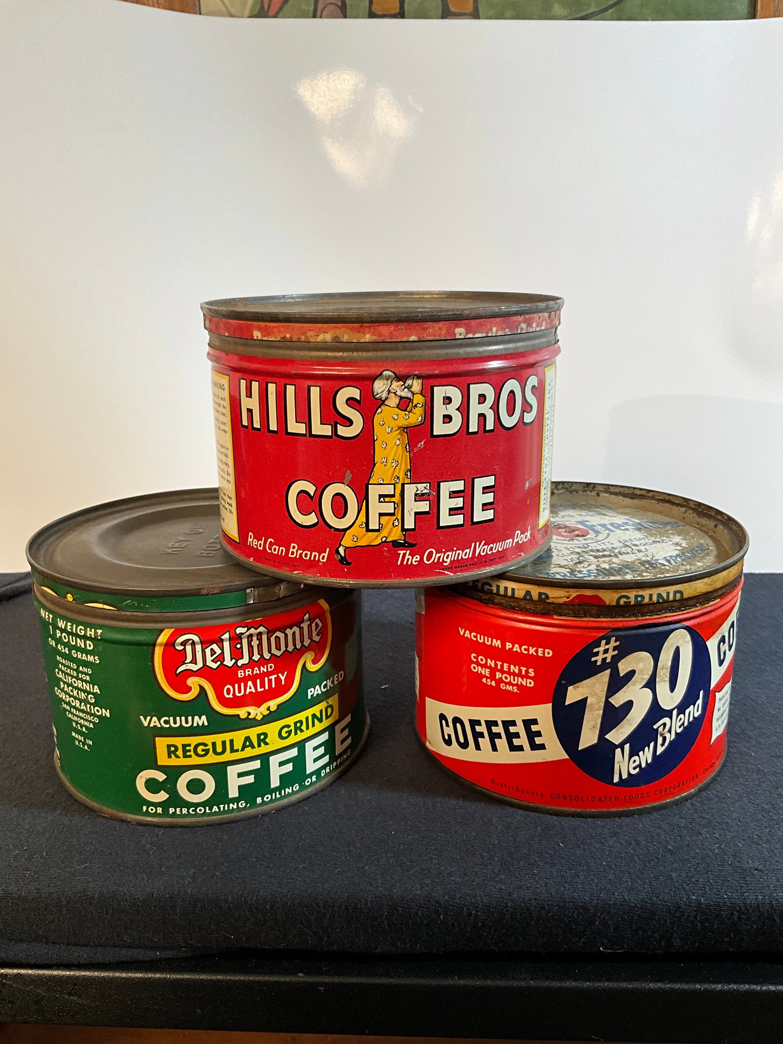 Lot of Three Vintage Coffee Tins, Del-Monte, Hills Bros & #730 New Blend, 1 Pound, All Have Lids: Lot of three vintage coffee tins. One is an Del-Monte Coffee out of San Fransisco. It is a one-pound tin with a lid. The second coffee tin is a Hill's Bros. Coffee out of San Fransisco California. It