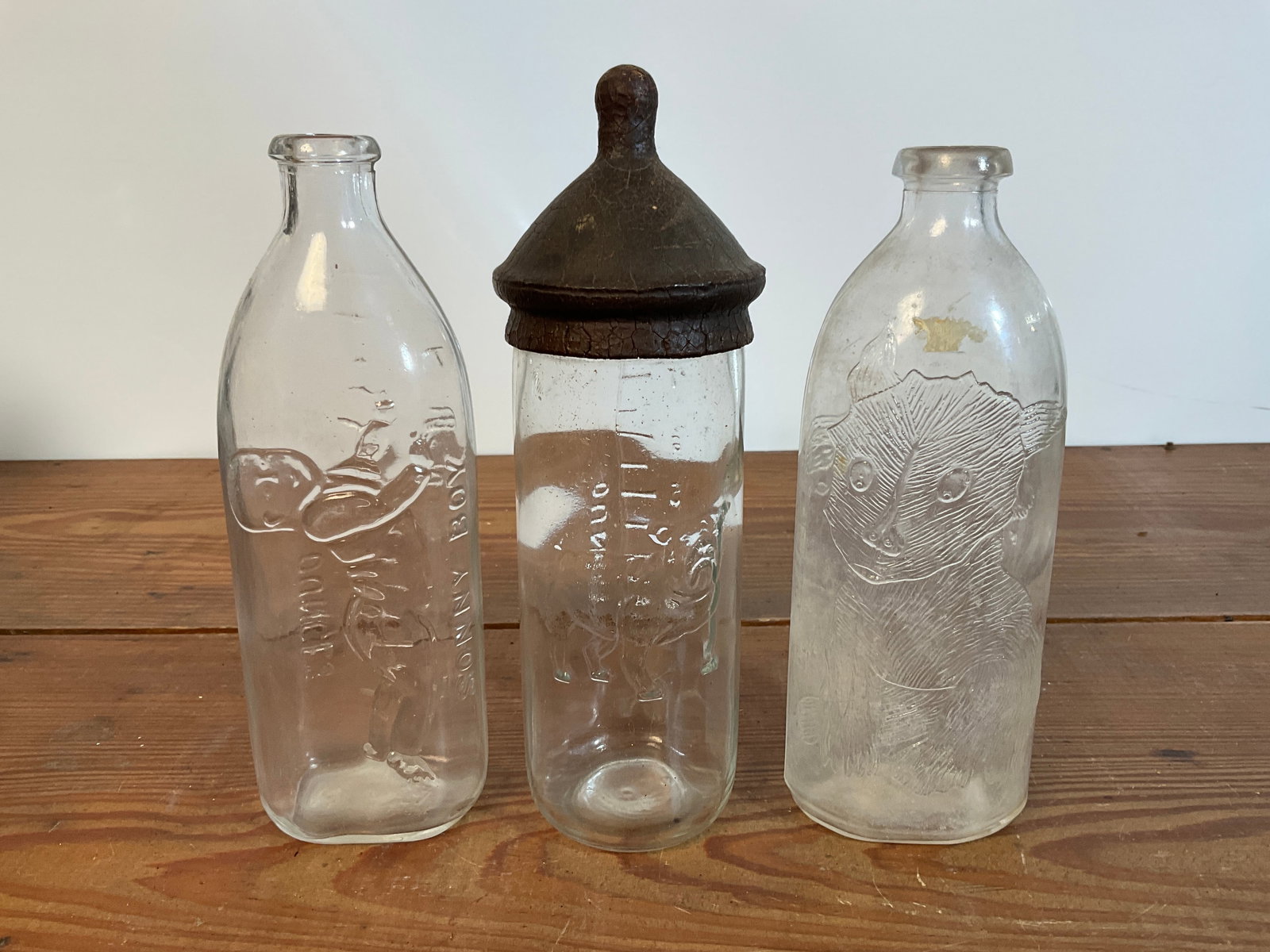 Set of Three 1940's Picture Baby Bottles, Embossed (1 of 2)