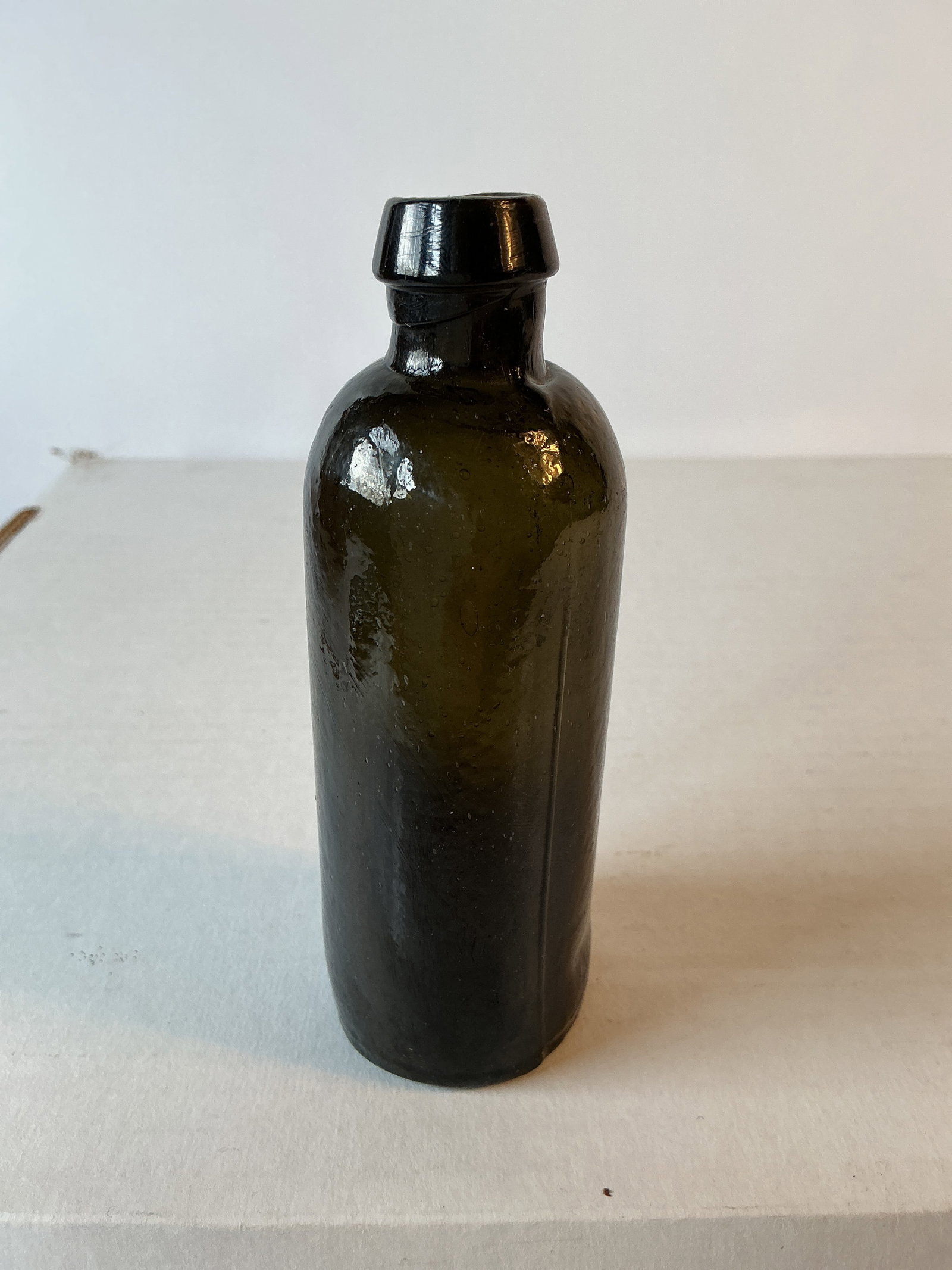 Early Olive Green Medicine or Utility, IP: Here's another olive green medicine or utility similar to #37 but with an iron pontil. Very crude and in great condition with no damage or stain. 4 3/4" tall.