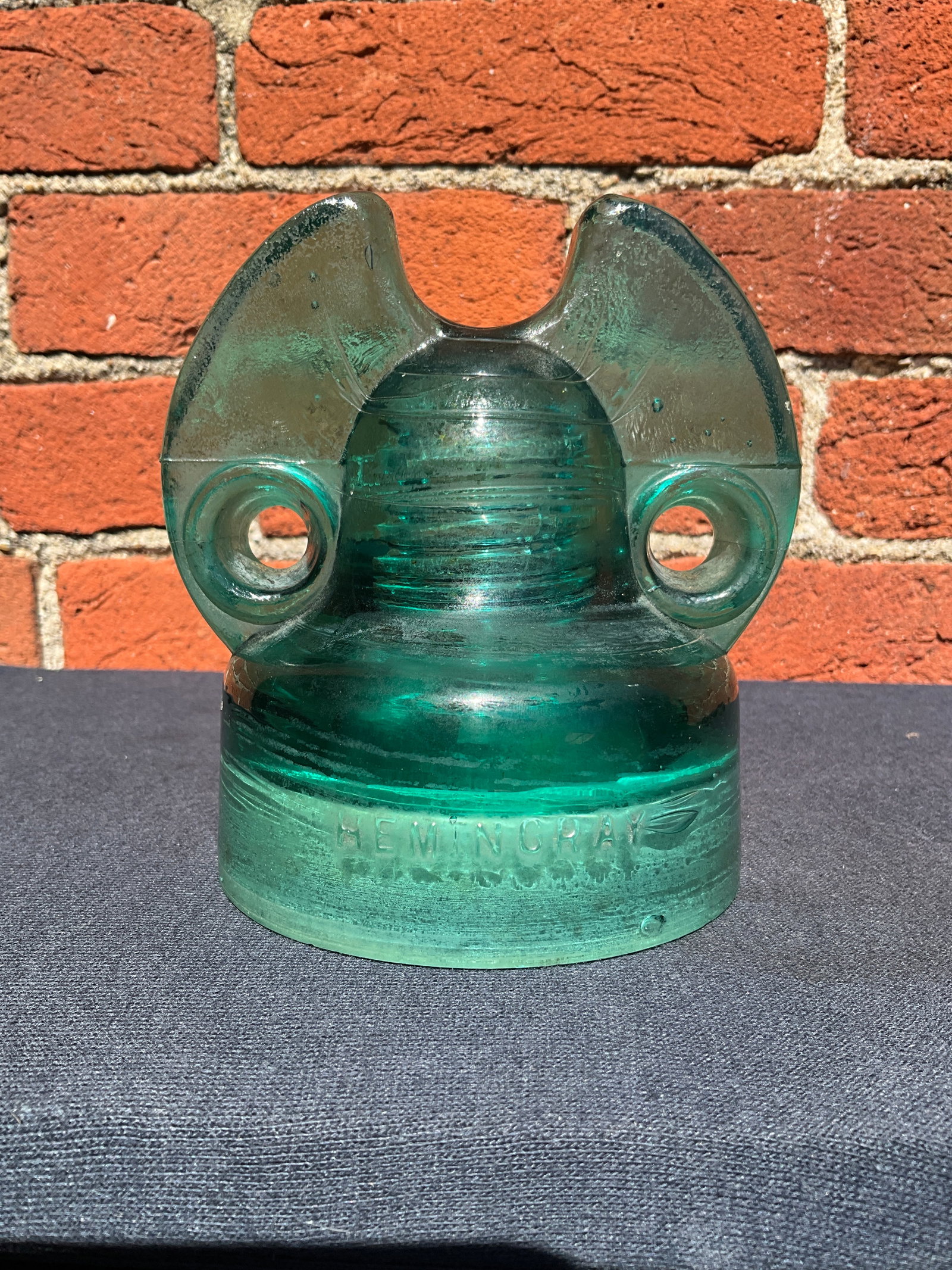 CD-263 Hemingray, Columbia Insulator, smooth, rounded base: Here is CD-263 Hemingray, Columbia Insulator, smooth, rounded base. There is one ding on the side of the insulator and a flake off of one of the ears. Relatively hard to find. This is a good-looking i