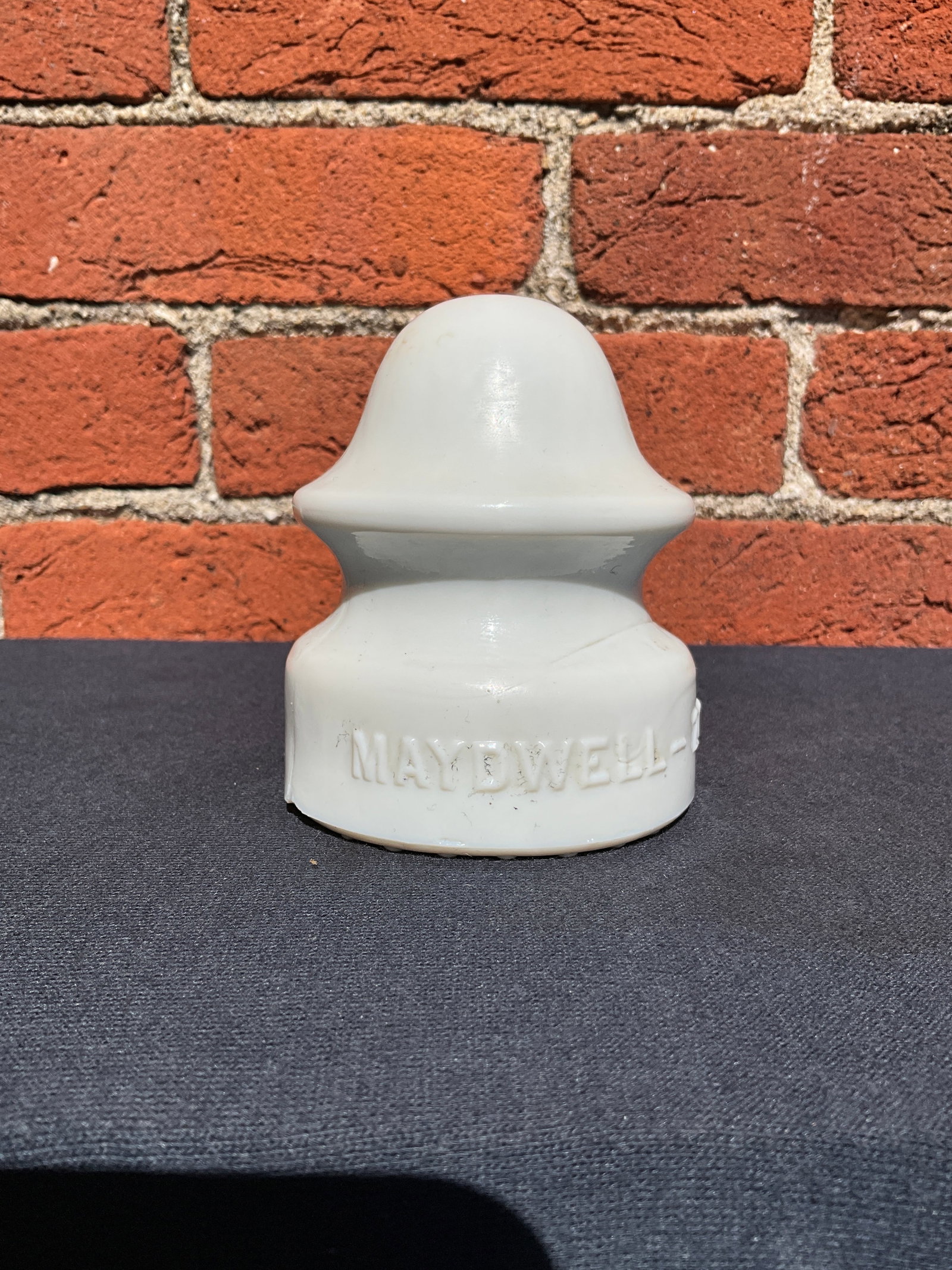 CD-164 - Maydwell - 20 White Milk Glass Insulator: CD-164 - Maydwell - 20 White Milk Glass Insulator. Here is an odd insulator in the fact that you don't find a lot in white Milk Glass. Round Drips on the base, but no damage.