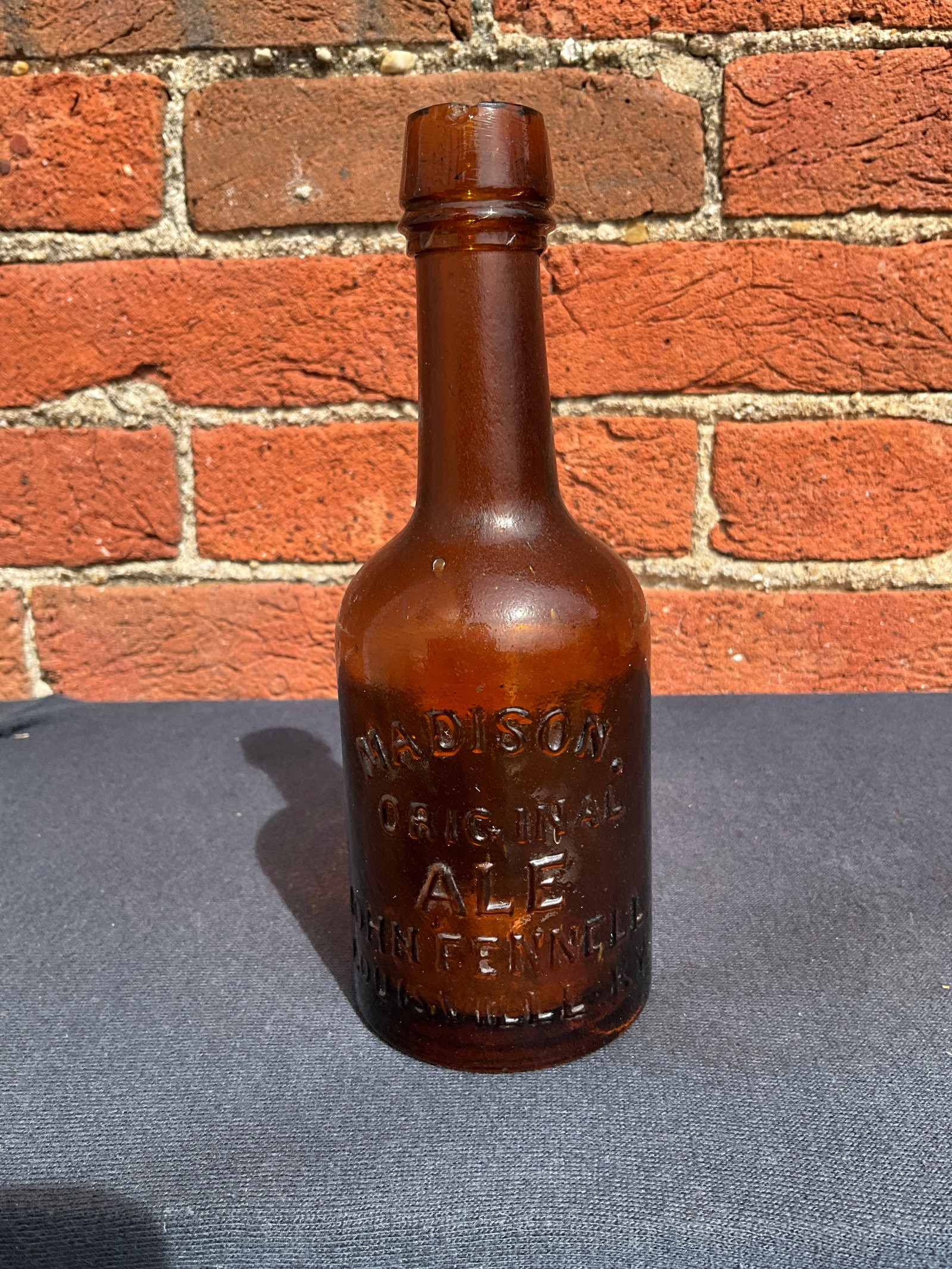 1870s Madison Original Ale - John Fennell Louisville Kentucky Soda - Honey Amber: Here is an 1870s Madison Original Ale - John Fennell Louisville Kentucky Soda - Honey Amber. There is an Ice pick chip on the lip, other than that no damage. The chip is about an 1/8 down on the front