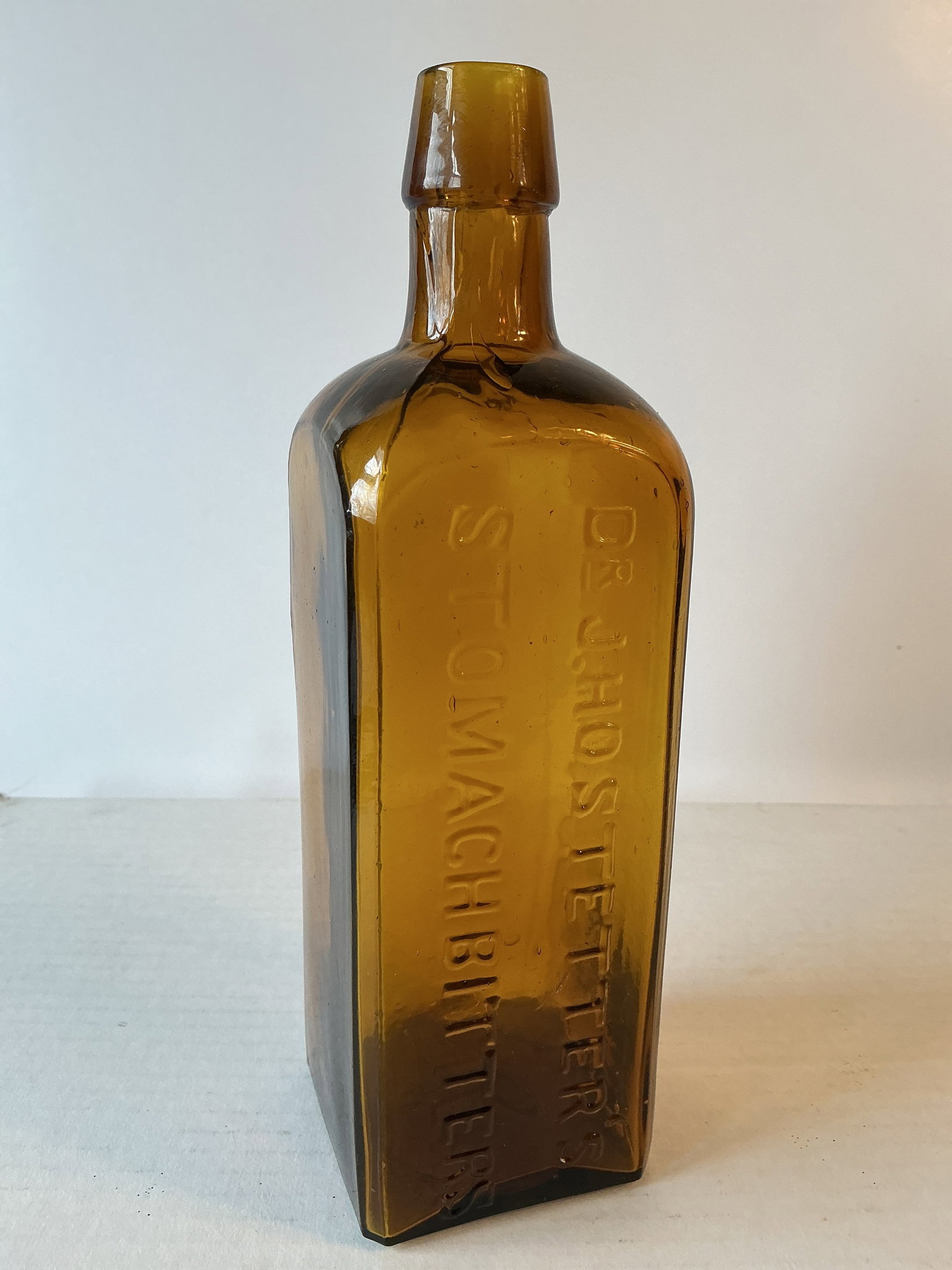 Dr. J. Hostetter's Stomach Bitters, Orange Amber (1 of 4)