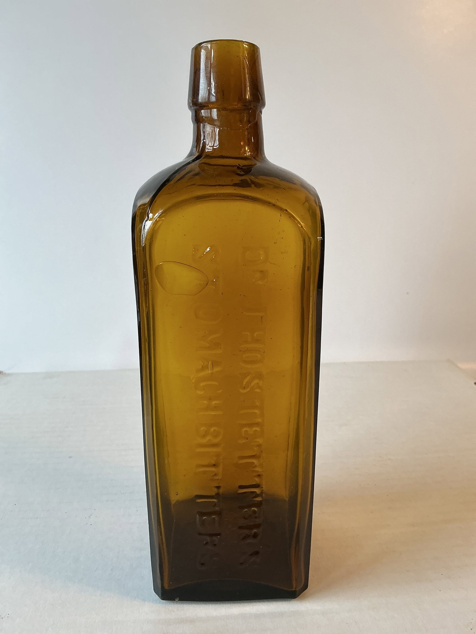 Dr. J. Hostetter's Stomach Bitters, Yellow amber w/ some olive. (1 of 4)