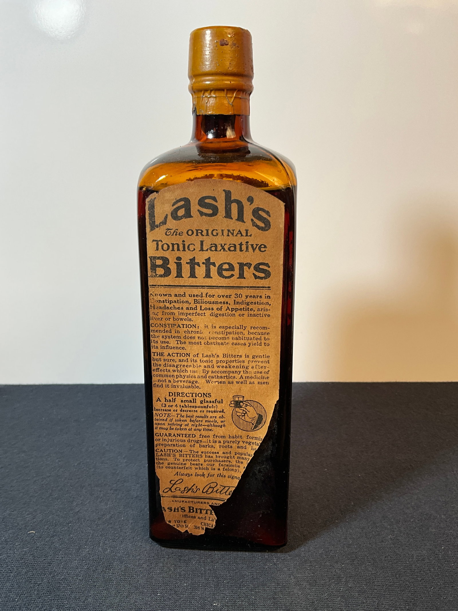 Lash's "The Original Tonic Laxative Bitters Bottle W/Labels and Contents. (1 of 6)