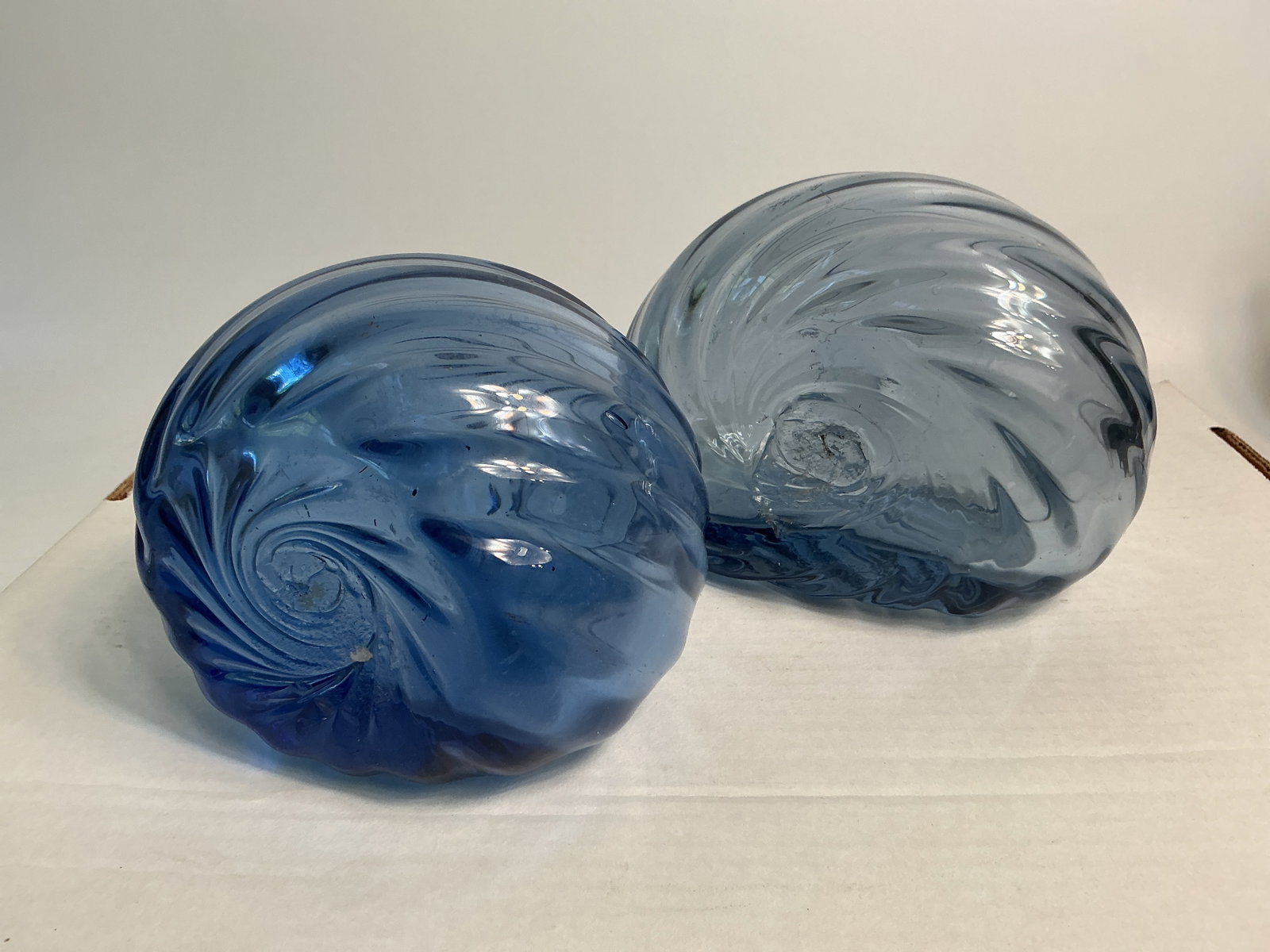 Murano Blown Glass Swirl Bookends: Here's a pair of Murano blown art glass bookends. Both pieces are hand blown and are pontil marked. The bookends are both swirled and have no damage. The darker one measures 4" x 5" x4" and the lighte