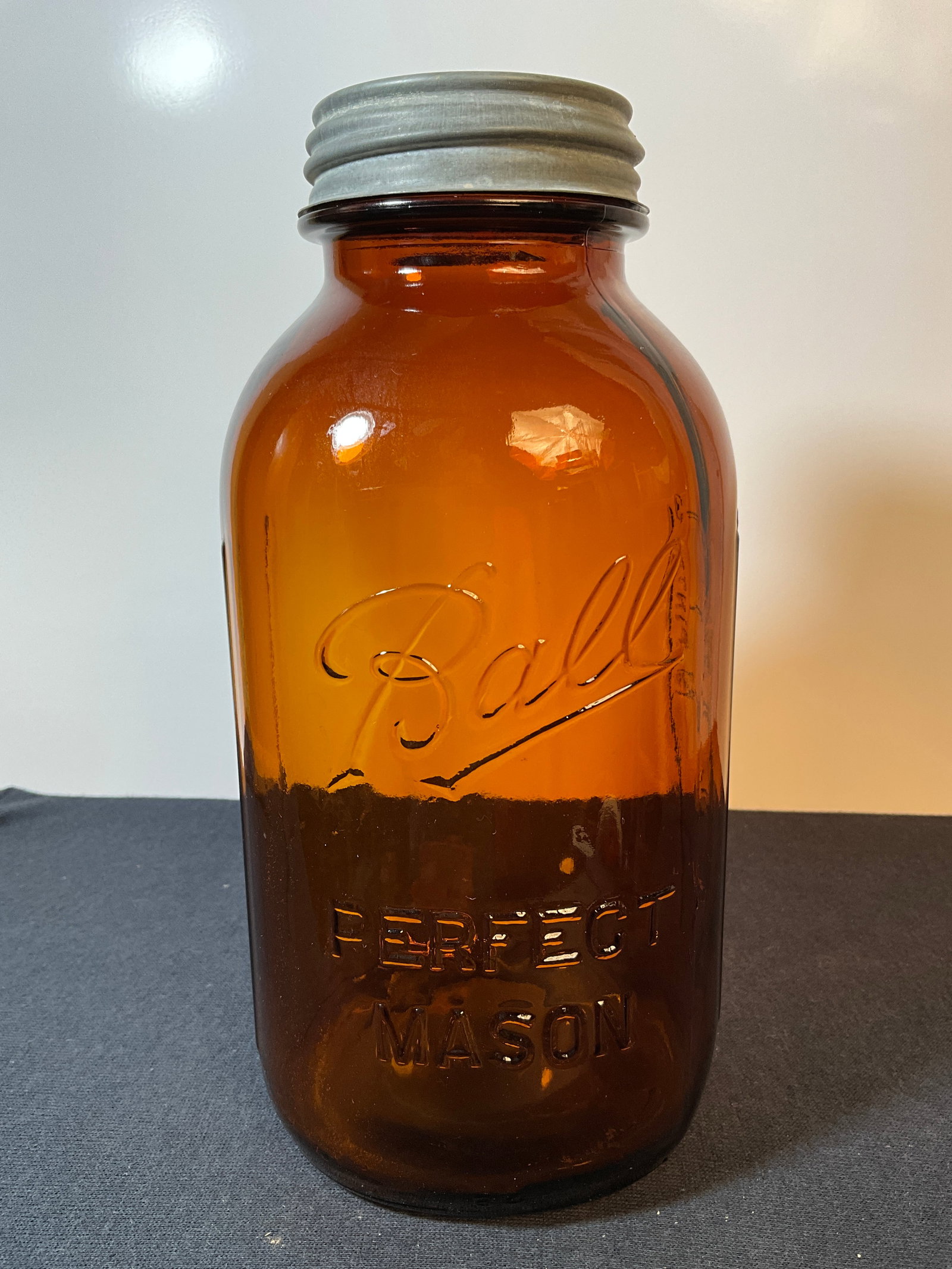 Amber 1/2 Gallon Ball Perfect Mason: Here is an Amber 1/2 Gallon Ball Perfect Mason. No damage and comes with the correct lid. These amber examples while not rare are highly sought after.