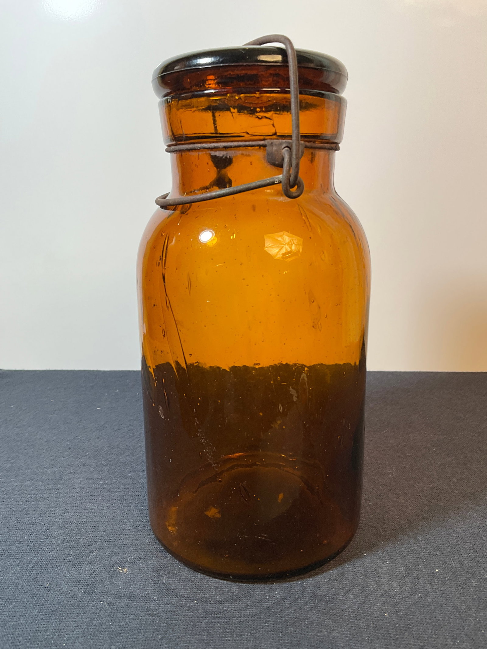 Amber Base embossed Putnum 411, Lightning Jar, Quart, Ground Lip. (1 of 8)