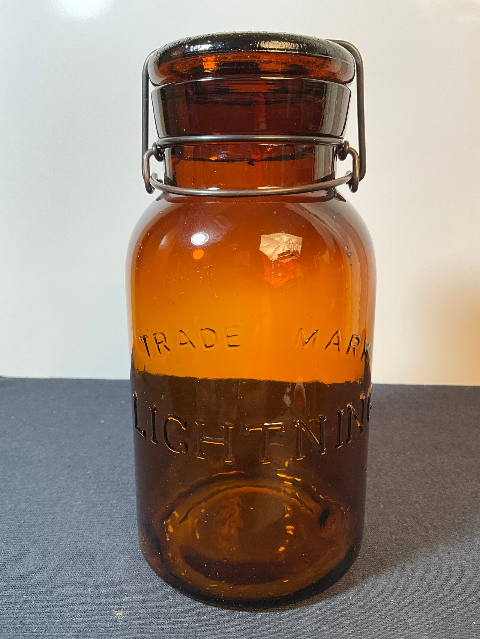 Amber Lightning Jar with Base embossed Putnum 227 - Reproduction, Quart, Smooth Lip.: Here is an Amber Lightning Jar with Base embossed Putnum 227 - Reproduction, Quart, Smooth Lip. Still a good looking jar, that's light from the middle of the jar down while the top is a lot darker. Ap