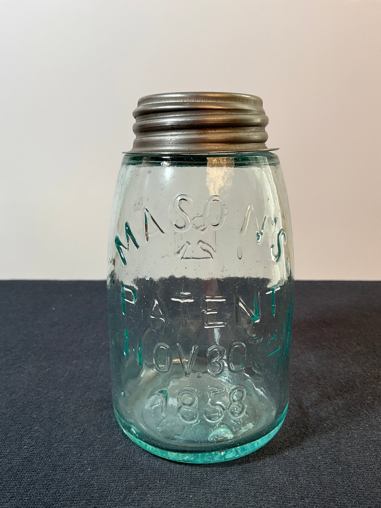 "Midget" Mason's Patent nov 30th 1858 with Reverse Iron Cross: Here is a ""Midget" Mason's Patent nov 30th 1858 with Reverse Iron Cross. Someone gave this jar a new lid, but it fits perfectly. No damage.