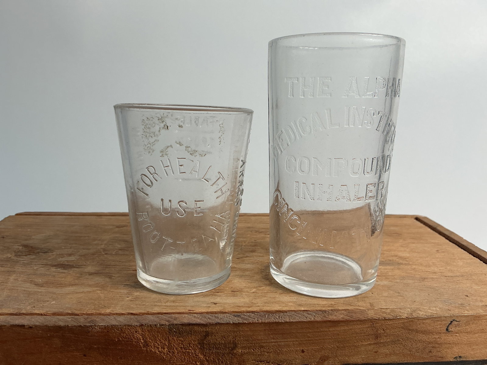 2 Embossed Ohio Dose Glasses - The Alpha Medical Institute & Root Tea Na Herb Co. (1 of 4)
