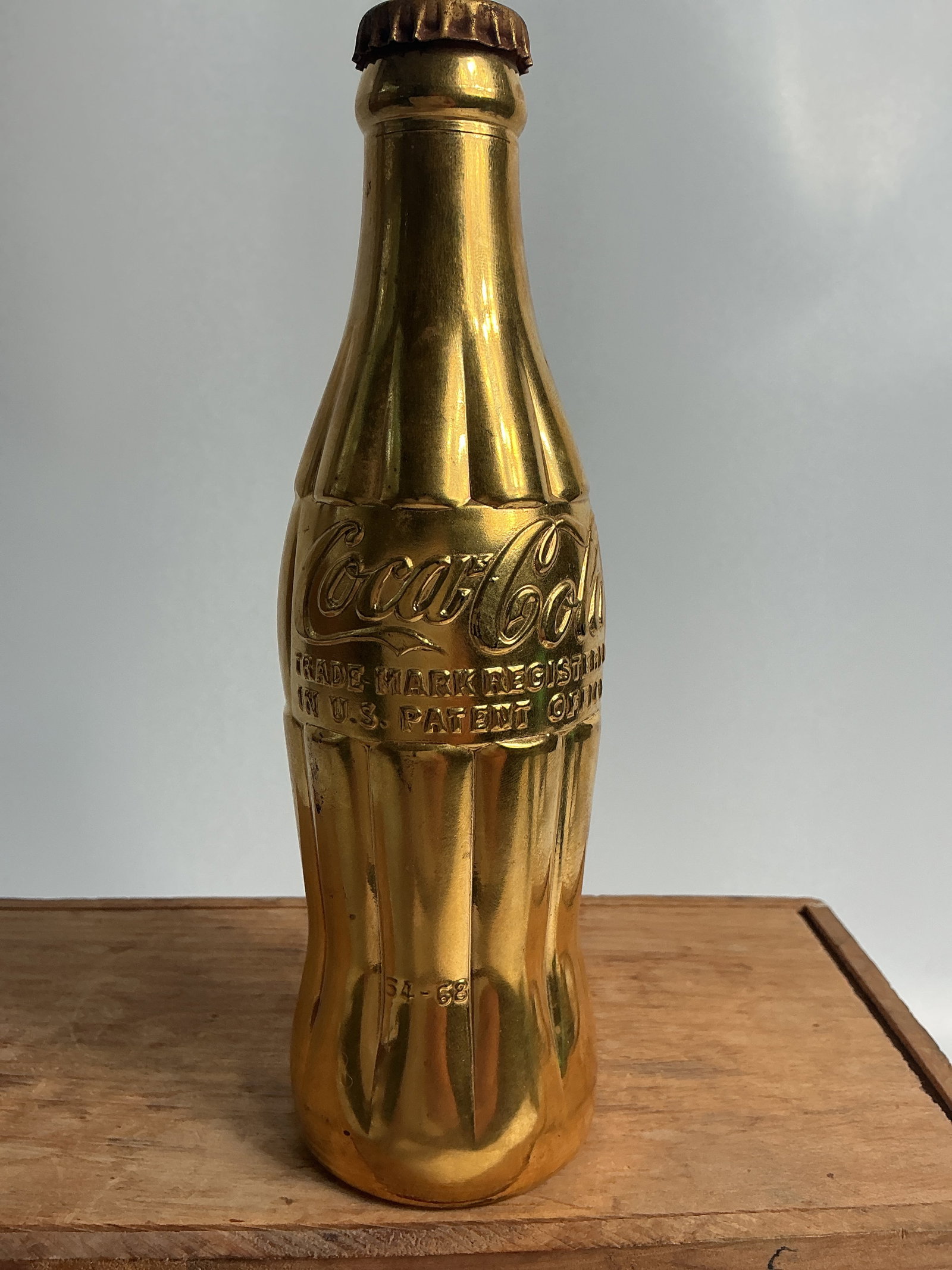 Gold colored hobbleskirt coke bottle Greenwood, Miss (1 of 4)