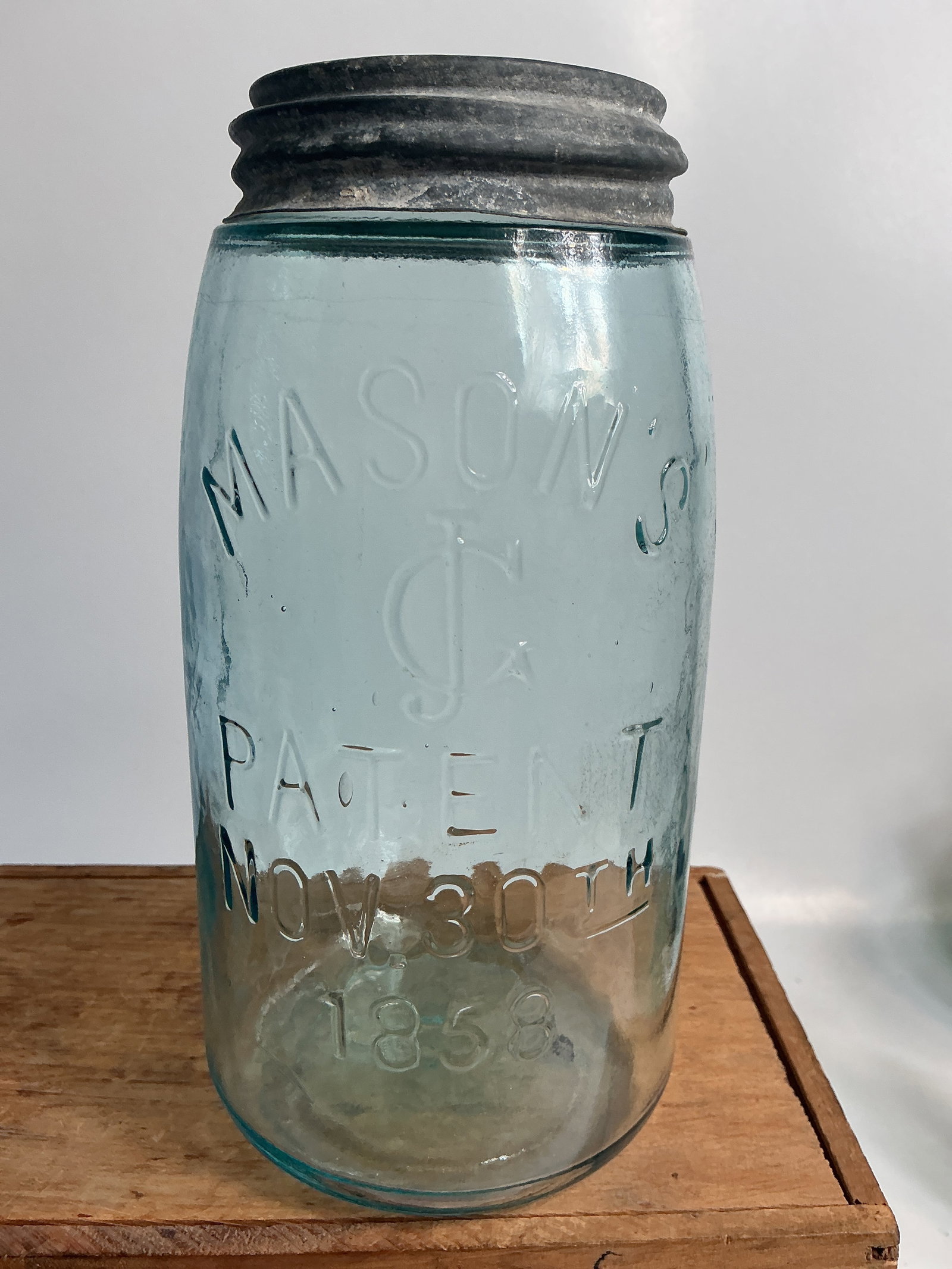 Mason's JG Patent Nov. 30TH 1858, Aqua, Quart: Here we have an unusual monogram Mason's JG Patent Nov. 30TH 1858. The jar is aqua, quart size and has a ground lip. The jar has some great glass character and no damage. Nice Jar!