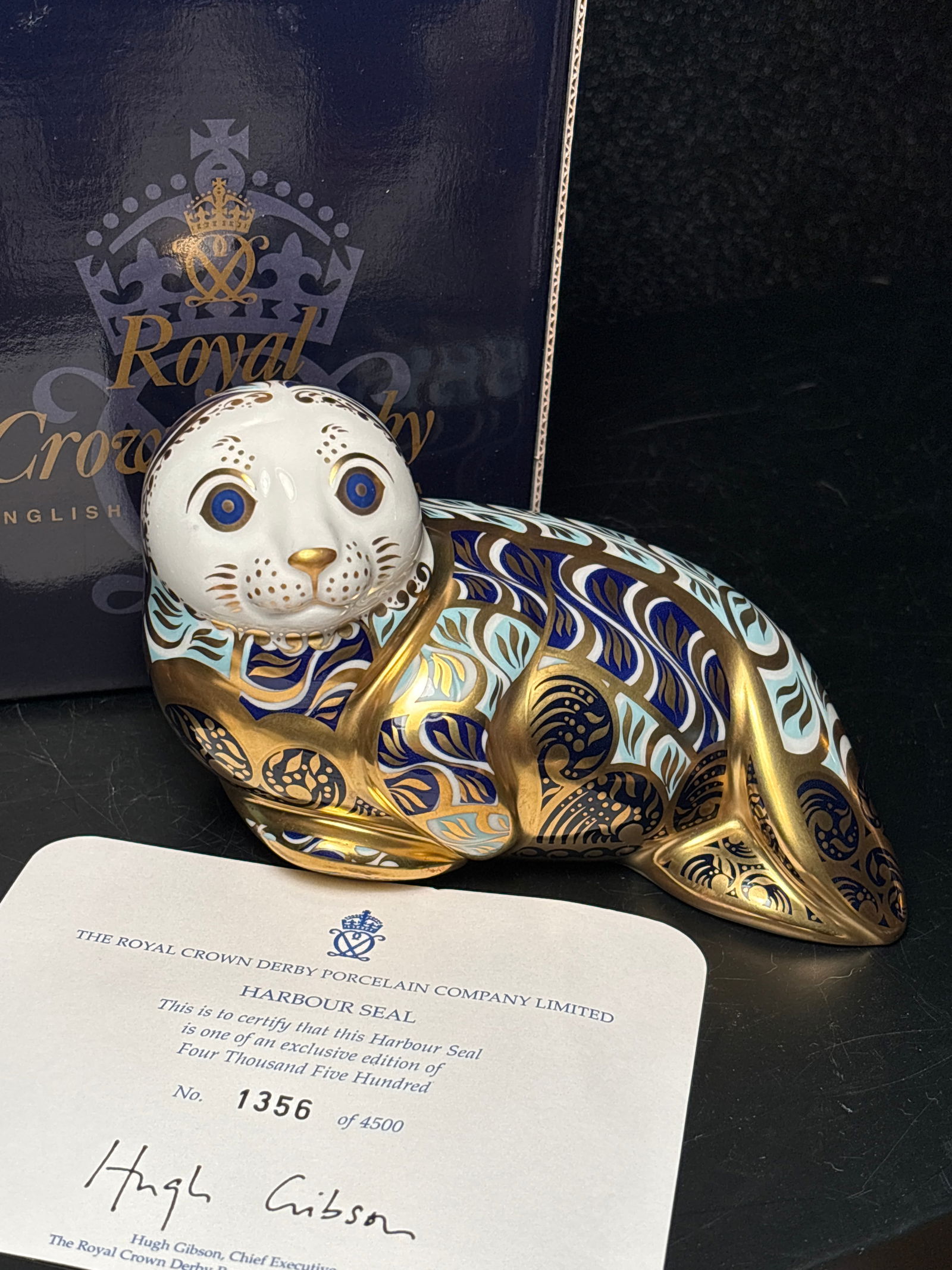 Artist signed 2001 Limited Edition Harbour Seal Royal Crown Derby 5 inch paperweight w/box: 2001 Limited Edition Harbour Seal Royal Crown Derby 5 inch paperweight. In original box with certificate of authenticity.In original box. Gold stopper.Hand painted made in England. Maker mark on botto