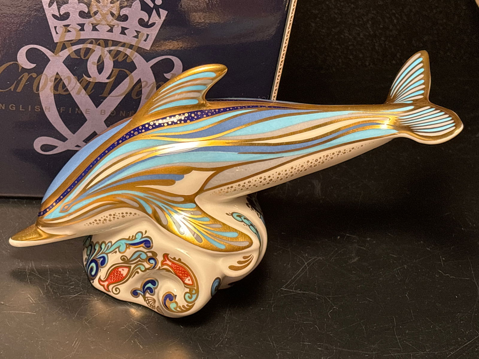 Stunning 7 inch long ‘Striped Dolphin’ Royal Crown Derby fine China paperweight w/box, gold: Stunning 7 inch long ‘Striped Dolphin’ Royal Crown Derby fine China paperweight in box.almost 4 inches tall at tail. Gorgeous colors. Like new. Very good condition.