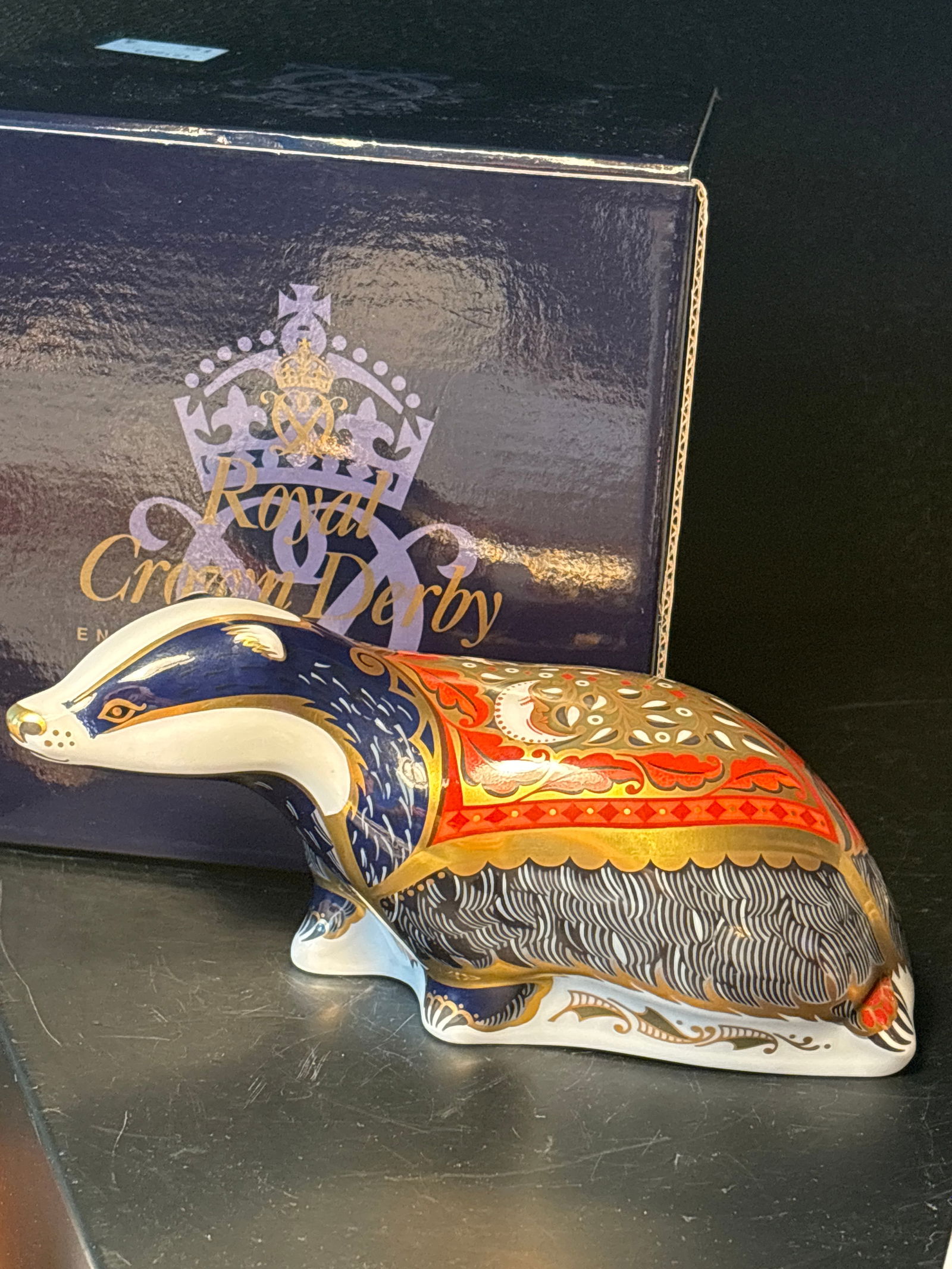2001 Exclusive ‘Moonlight Badger’ Royal Crown Derby 7inch long bone china paperweight in box: 2001 Exclusive Collectors Guild “Moonlight Badger” Royal Crown Derby 7 inch bone china paperweight in box. Hand painted in England. Gold stopper.With original box.Very good condition.