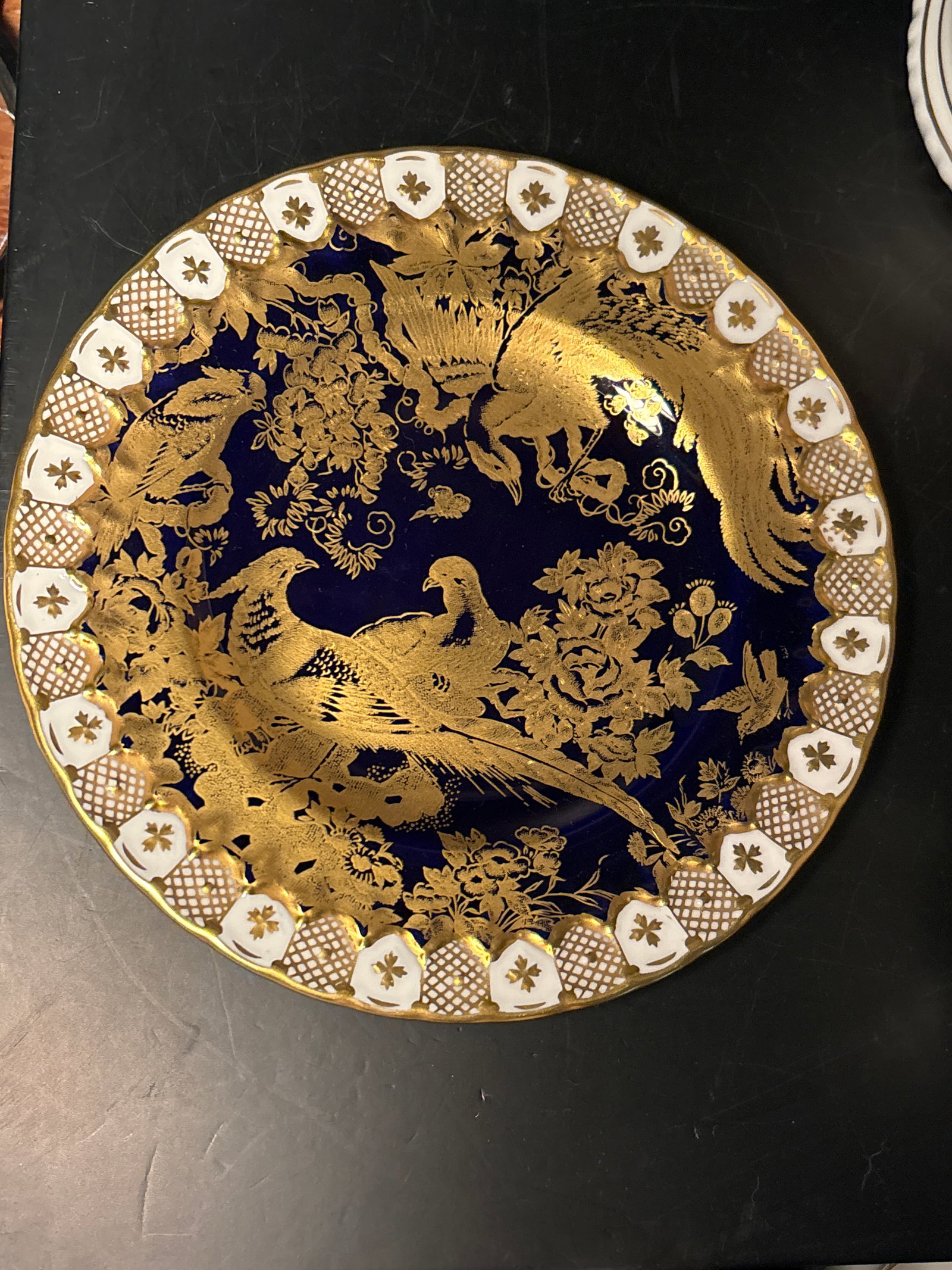 Lovely Paradise Cobalt Blue 6&1/4 inch Royal Crown Derby English bone china side plate: Lovely Paradise Cobalt Blue 6&1/4 inch Royal Crown Derby English bone china side plate. Heavy gold enamel Hand painted in England. Gold stopper.With original box.Very good condition.
