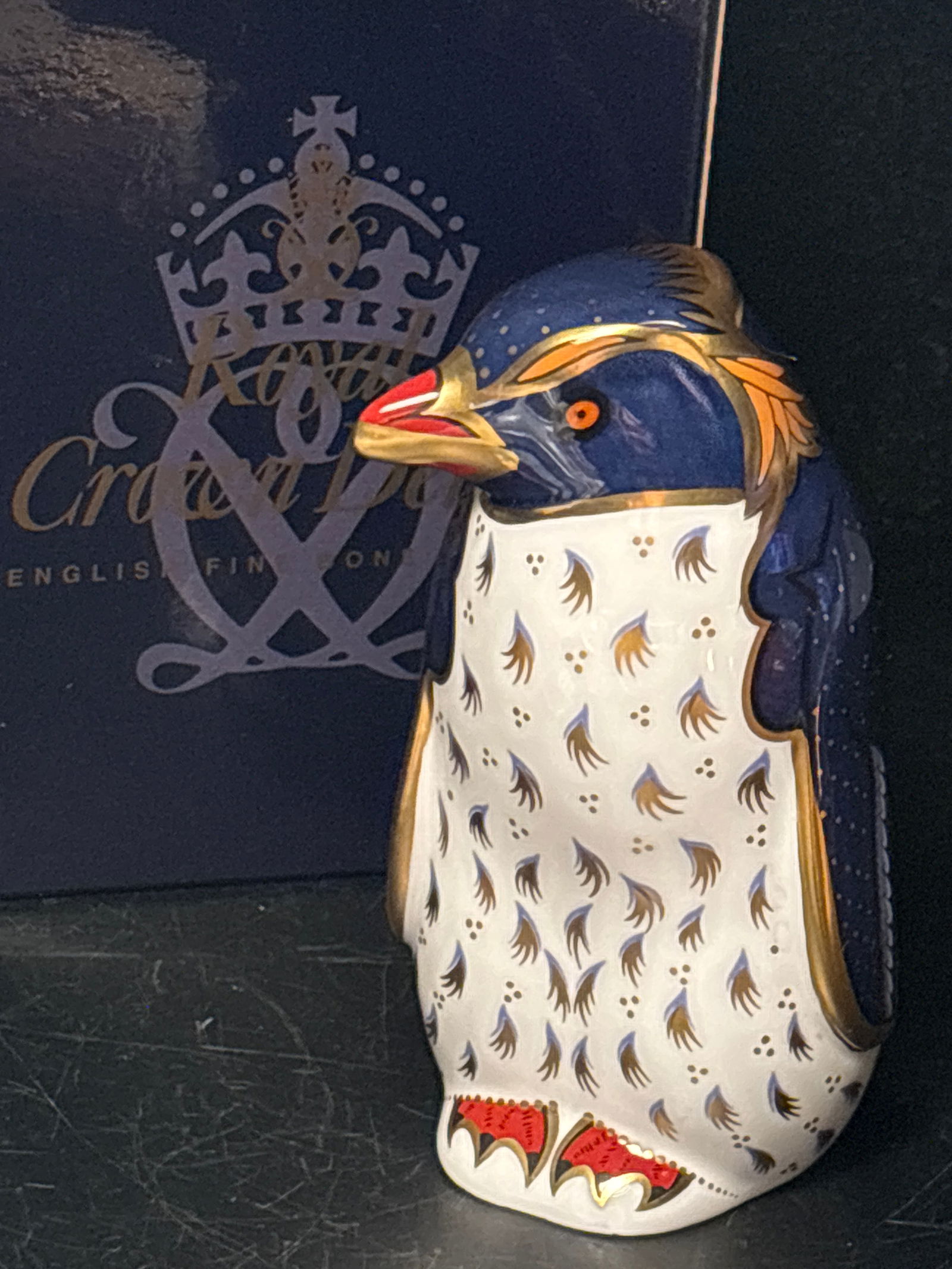 2002 Rockhopper penguin 4 inch Royal Crown Derby English bone china paperweight: Rockhopper penguin 4inch Royal Crown Derby English bone china paperweight . In original box. Gold stopper.Hand painted in England. Very good condition.