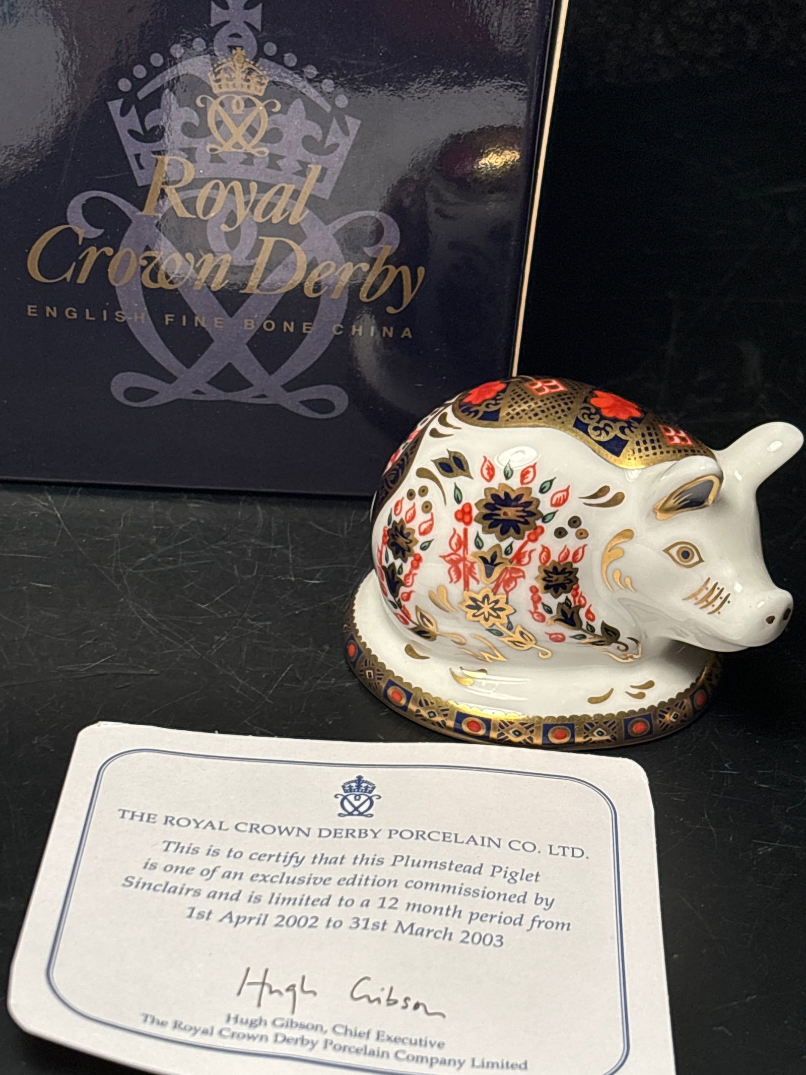 Sinclairs Exclusive 2003 ‘Plumstead Piglet’ Royal Crown Derby bone china small paperweight: 2003 small Plumstead Piglet 2x 3 inch Royal Crown Derby bone china paperweight. Original box. Silver stopper. Hand painted.Very good condition.