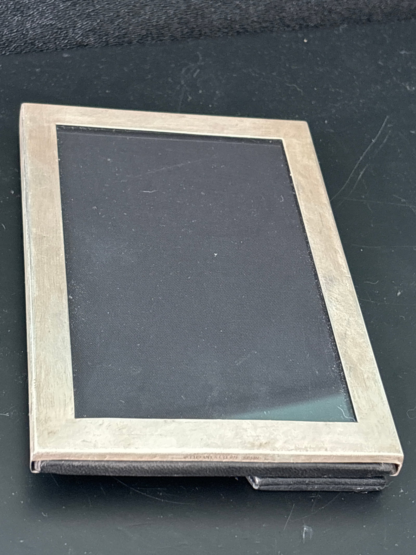Vintage Tiffany & Co. 925 Sterling silver dresser top picture frame: Vintage Tiffany & Co. 925 Sterling silver dresser top picture frame. Marked Tiffany & Co .925 Spain. 6 inches by 4 inches.Solid and well made.
