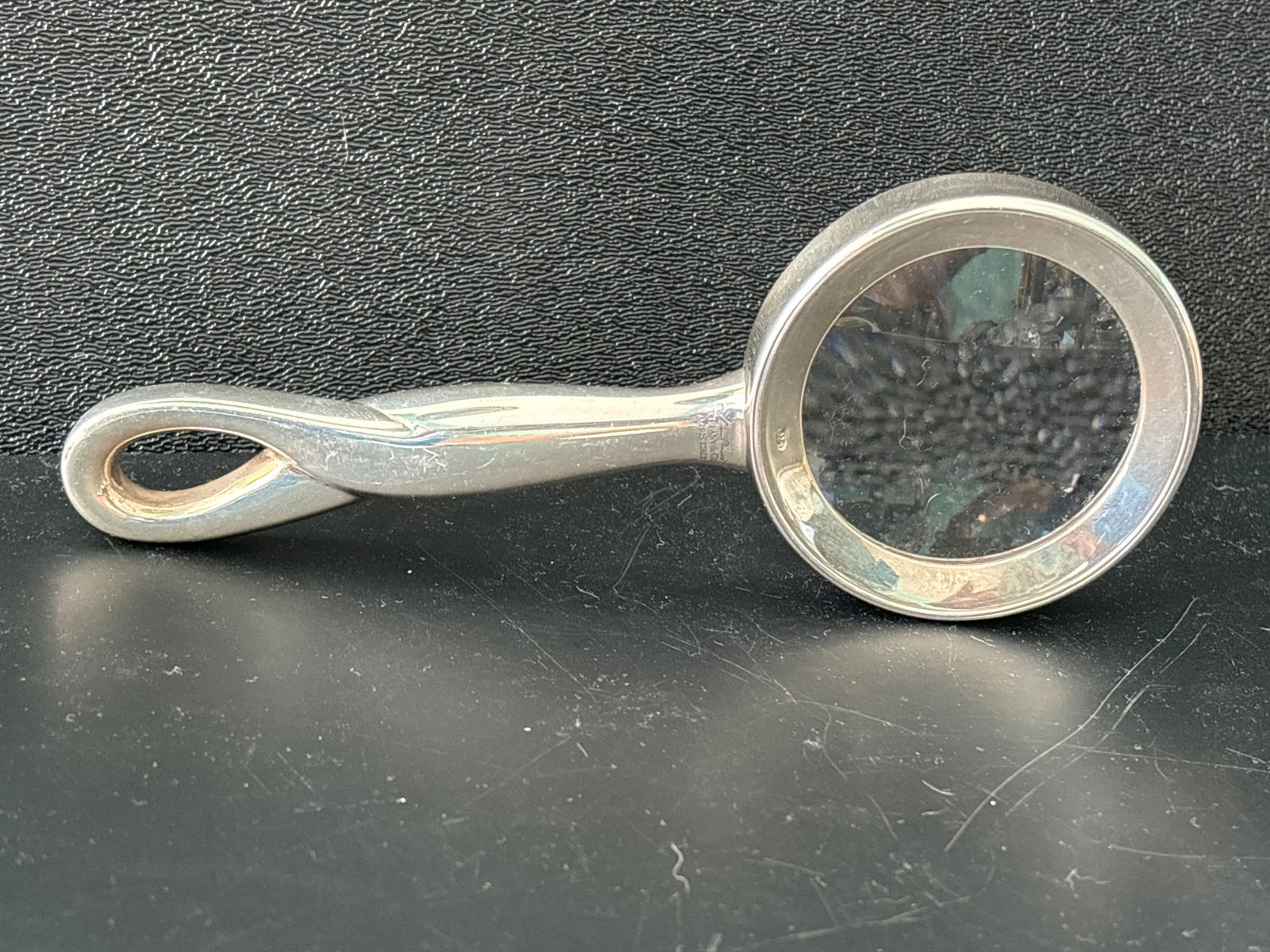 6 inch Vintage Tiffany & Co. 925 Sterling silver dresser top magnifying glass: Vintage Tiffany & Co. 925 Sterling silver dresser top magnifying glass. Marked Tiffany & Co .925 Italy. 6 inches by 2&1/2 inches.well made.