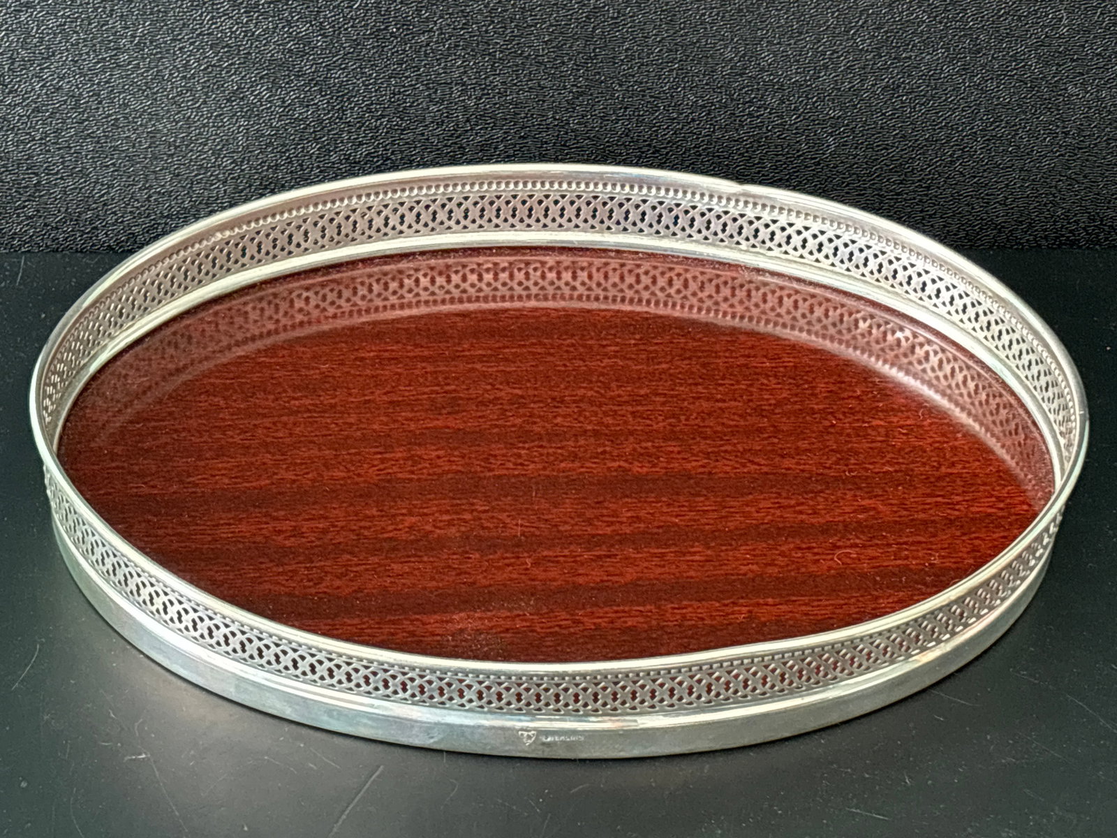 Vintage sterling silver oval desktop 9inch wood tray: Vintage sterling silver framed oval desktop 9 inch wood tray. 6&1/2 inch wide by 2 1/2 inch tallest point..well made.