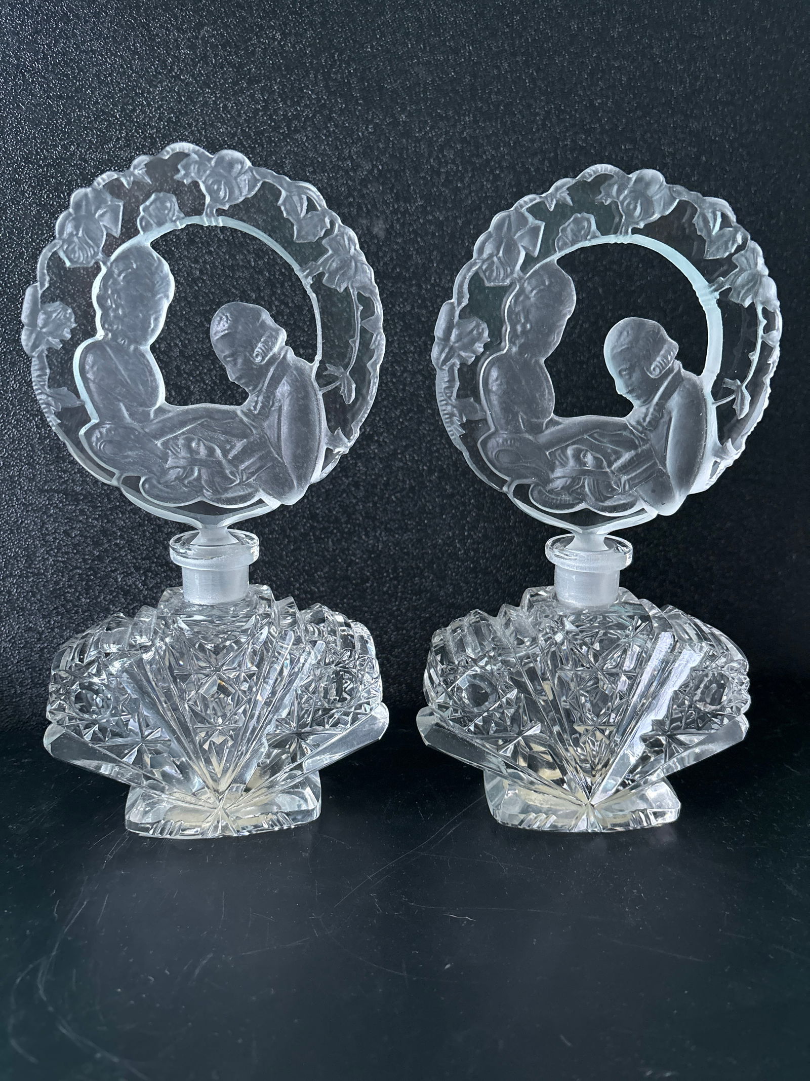 Pair Art Deco Cut Crystal 8 1/2 inch perfume bottles with scenic stoppers. (1 of 8)