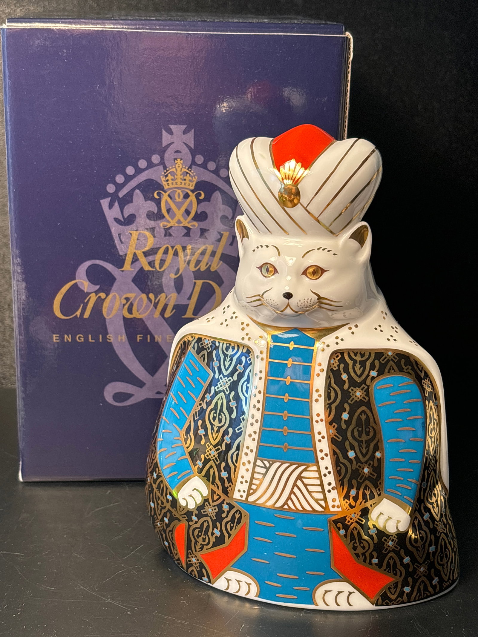 Big Royal Crown Derby English fine bone china Persian Royal Cat w/box: 6&1/2” tall by 5&1/2” at widest.The Royal Cat collection of Royal Crown Derby depicting a Persian cat with turbin.Excellent quality. These are hand painted in England.With original box.Ver