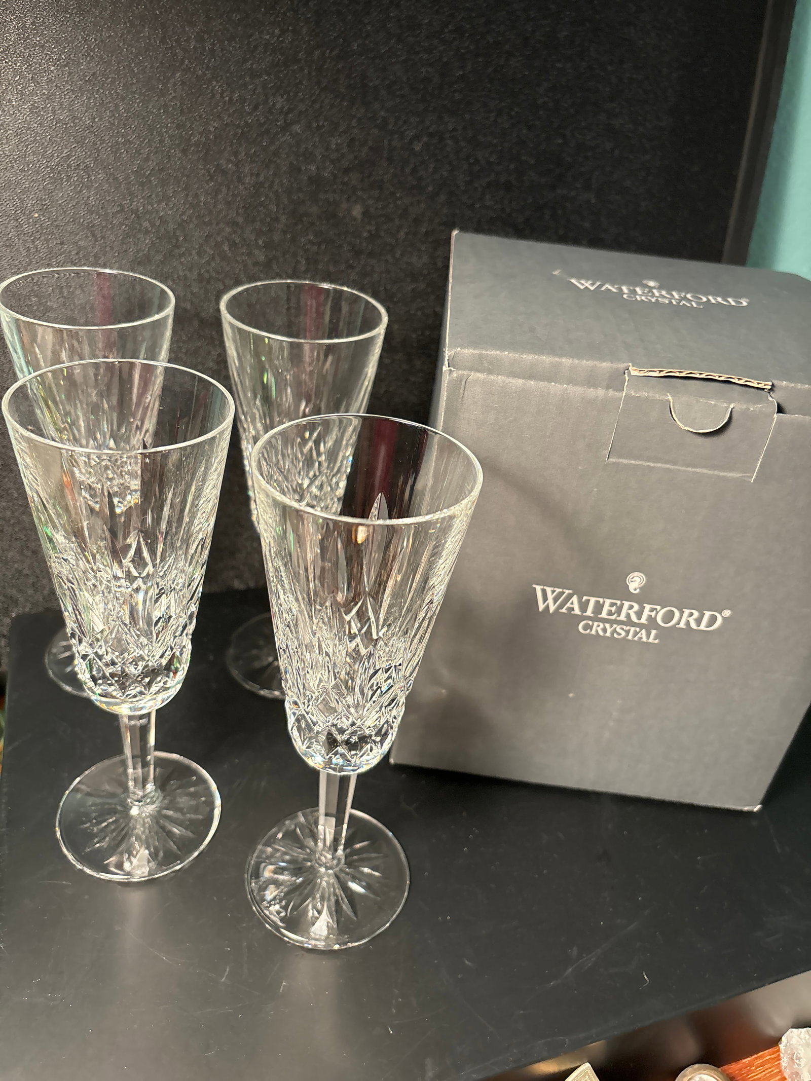 Boxed set 4 Waterford Irish Cut crystal 7&1/2inch champagne glasses: Boxed set 4 Waterford Irish Cut crystal 7&1/2inch champagne glasses.In original fitted box.Good estate condition, no damage