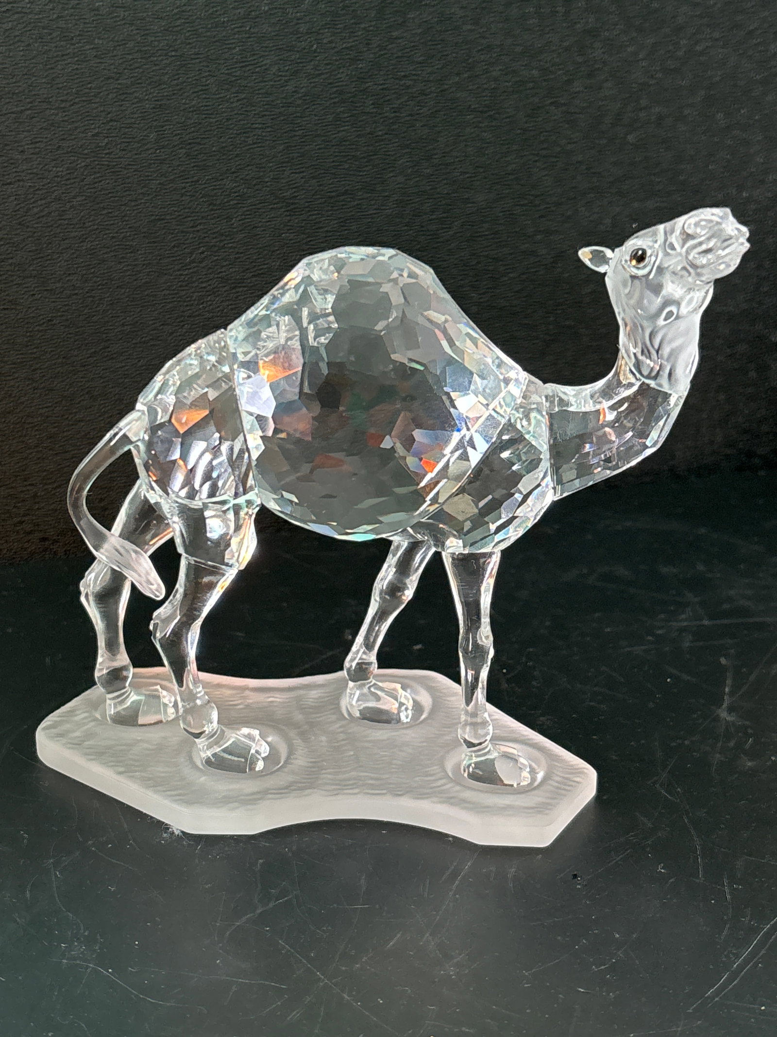 Big Swarovski Austria 5 inch camel form fine cut crystal statue: Vintage Swarovski Austria 5 inch statue.Signed on bottom. It is about 5 inches tall. Good condition