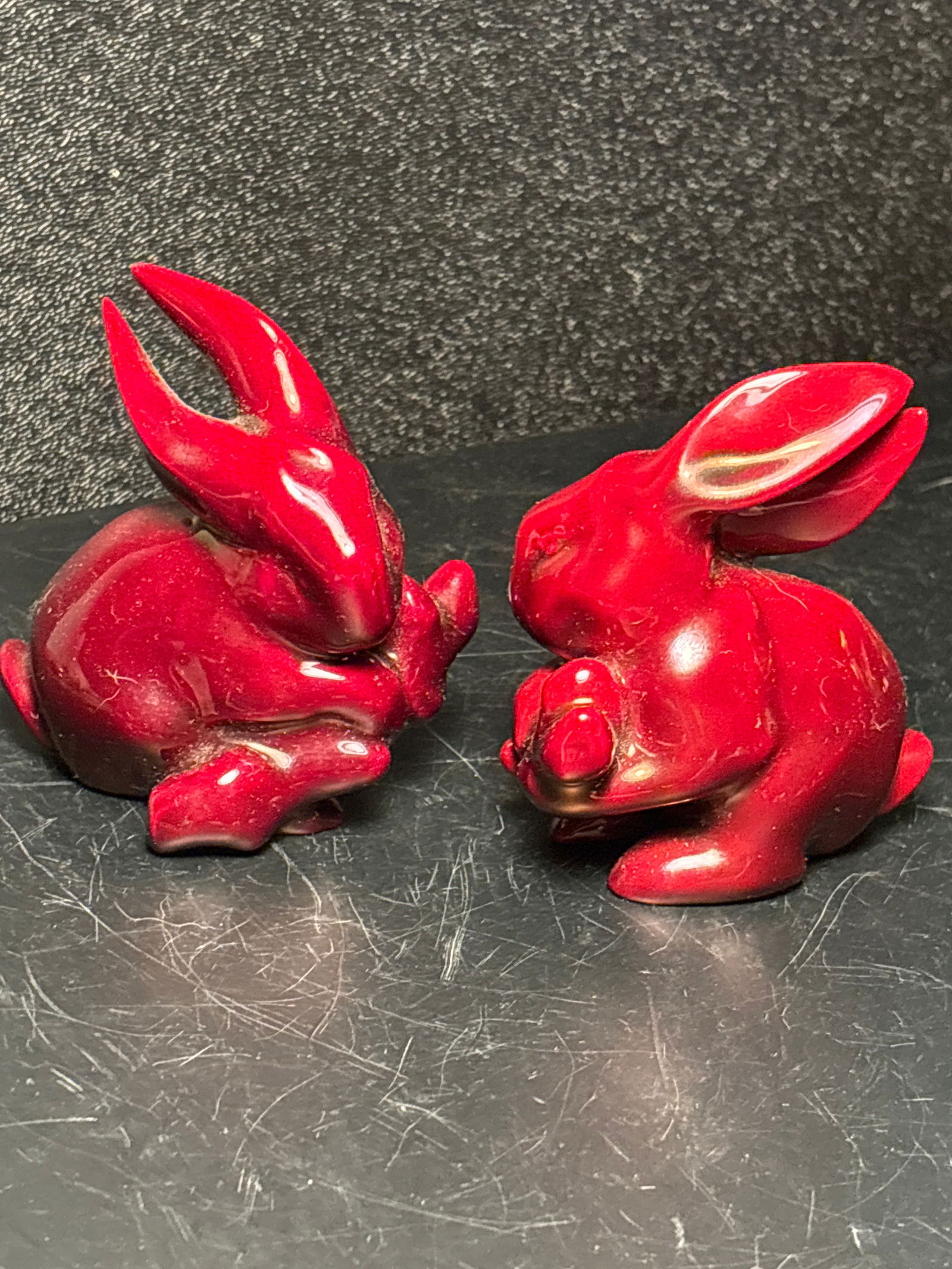 Two Vintage Zsolnay Pecs Austrian red flambé glazed porcelain 2&1/2 inch rabbits statues: Two Vintage Zsolnay Pecs Austrian red flambé glazed porcelain 2&1/2 inch rabbits statues.Good condition with no damage.