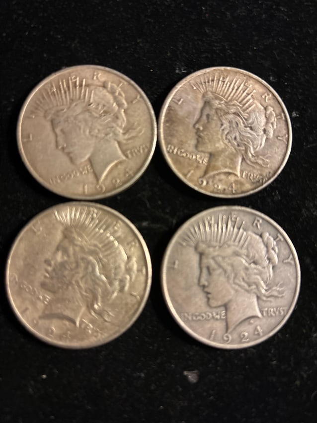 Group of Four (4) 1924 Peace silver dollars (1 of 6)