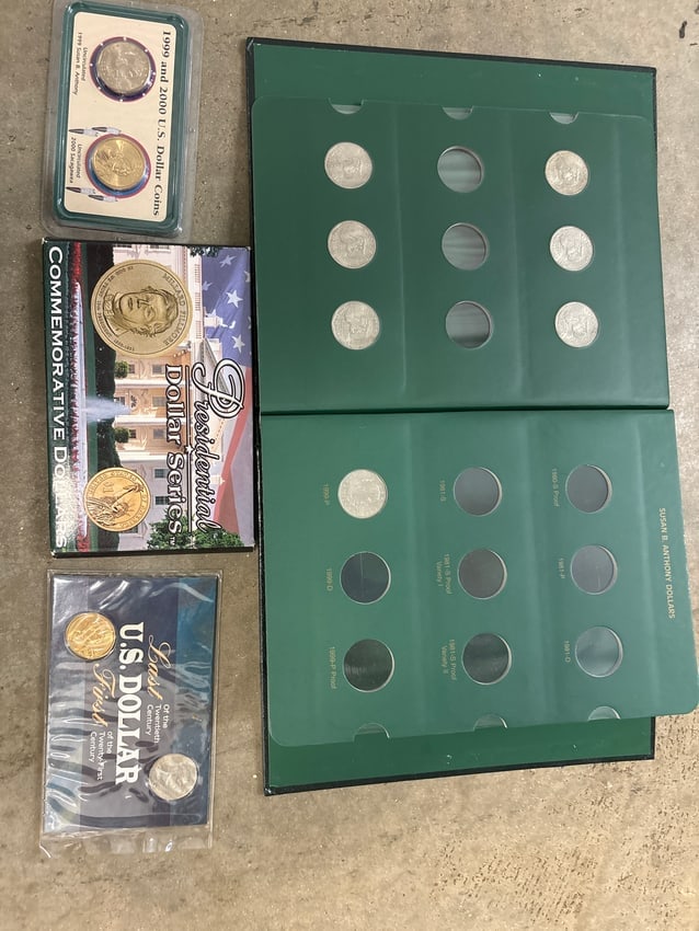 Four sets of one dollar coins collection; 14 $1 coins (Susan B. Anthony book is incomplete; only se (1 of 4)