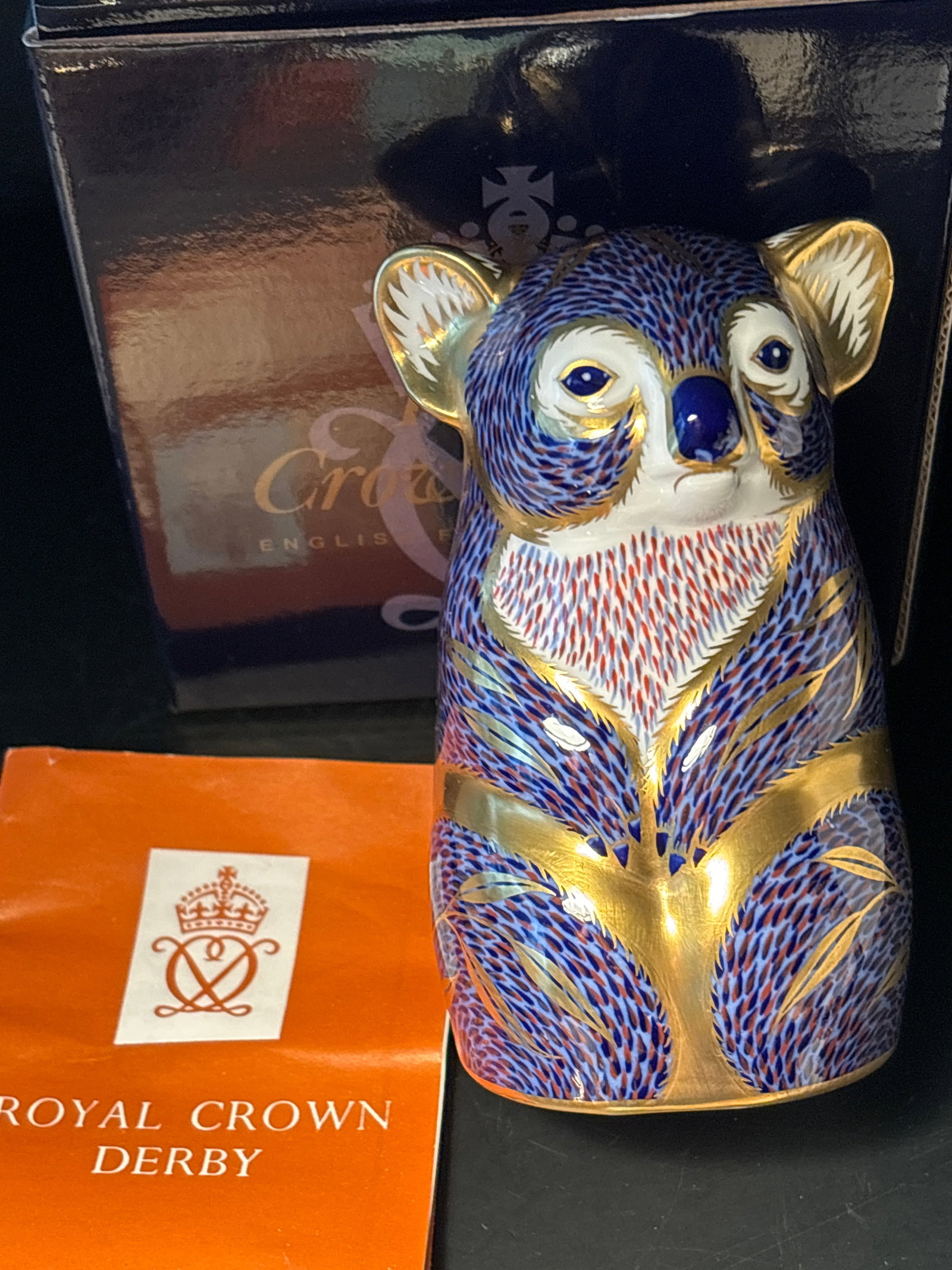 Imari Koala bear Royal Crown Derby 4&1/2 inch paperweight statue: Imari Koala bear Royal Crown Derby 4&1/2 inch paperweight statue. In original box. With silver stopper..Very good condition