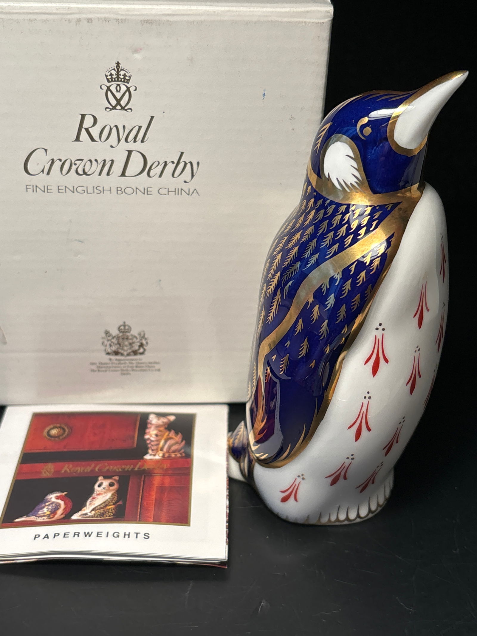 Imari Penguin Royal Crown Derby English bone china 5&1/2 inch paperweight statue: Imari Penguin Royal Crown Derby English bone china 5&1/2 inch paperweight statue.In original box. With silver stopper..Very good condition