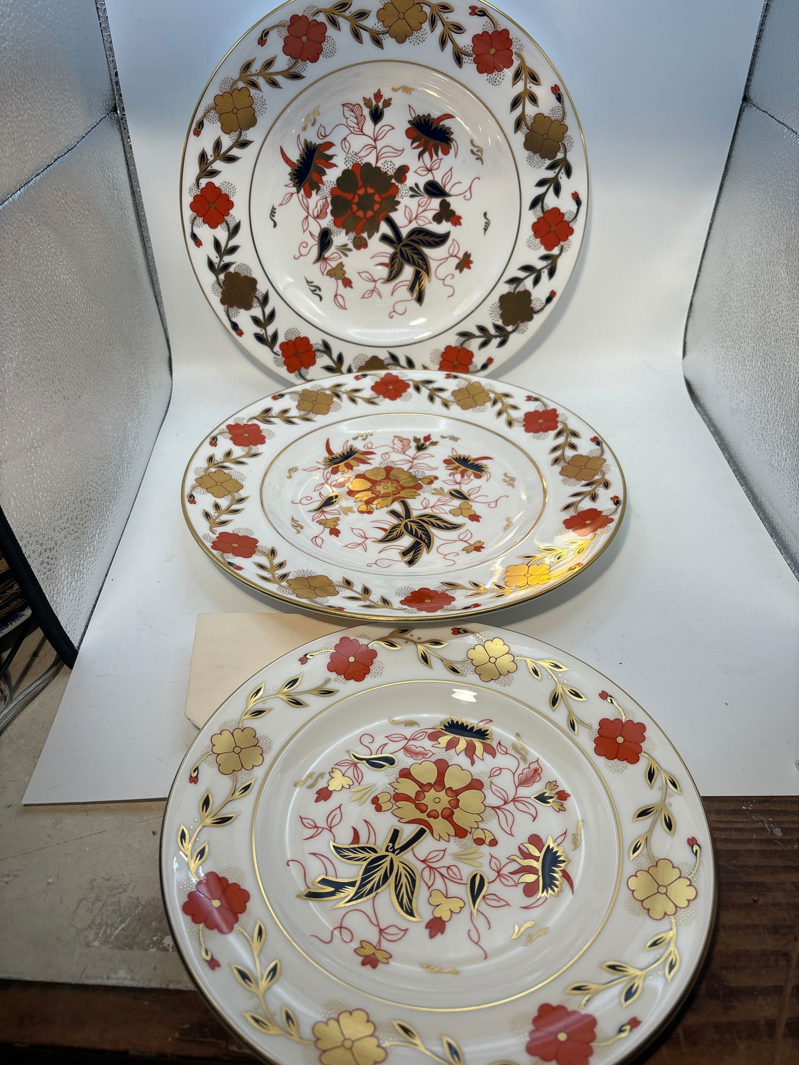 Three ‘Asian Rose’ 8687 pattern Royal Crown Derby English china plates: SitRoyal Crown Derby asian rose English china plates. Pair large 10&1/2” dinner plates and a single 8&1/2” plate.Gold stopper. Very good beautiful condition