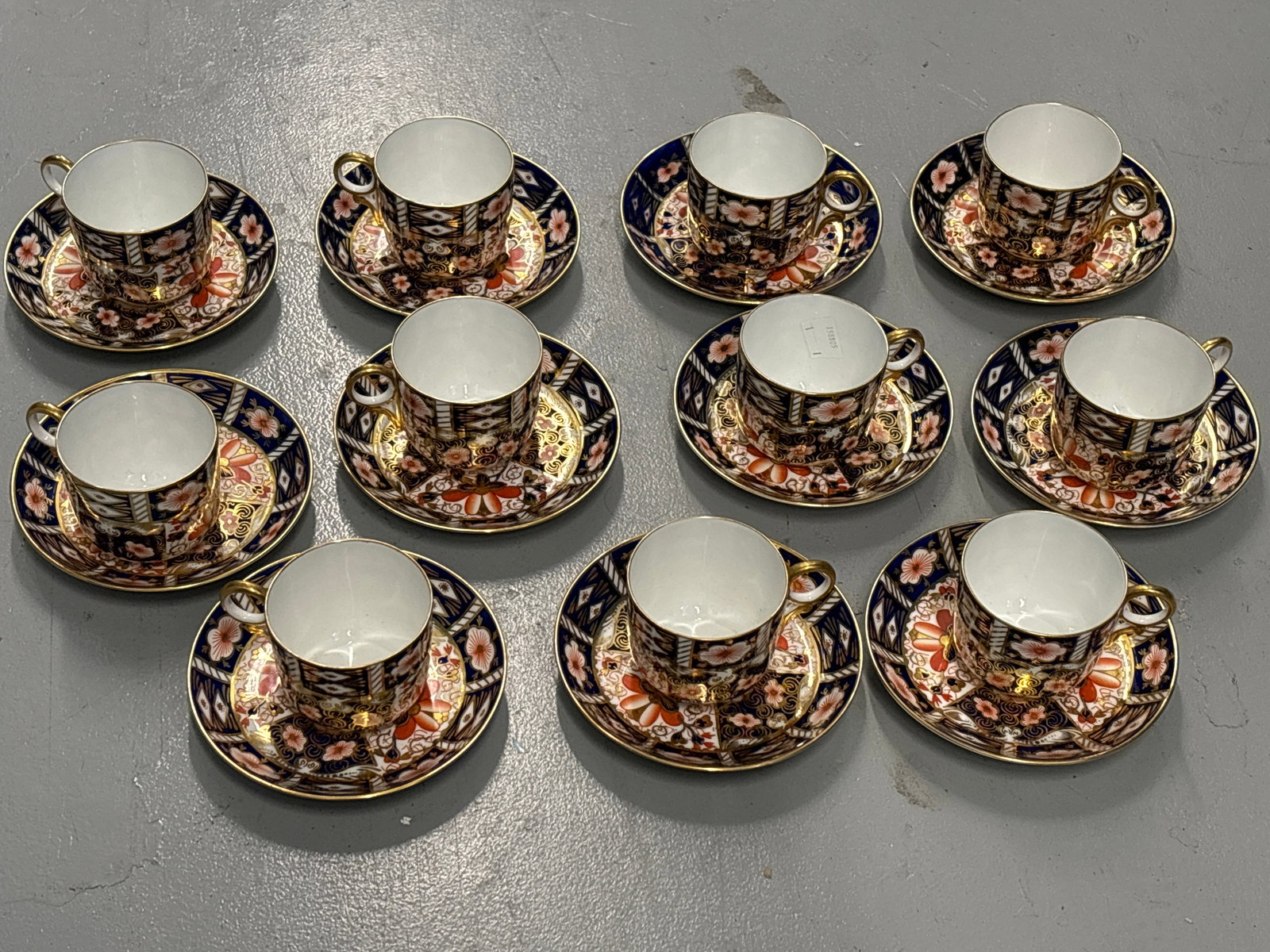Antique Imari 2451 eight cups & saucers Royal Crown Derby England: All in excellent condition having been stored in an English cupboard for close to 100 years!Royal Crown Derby 2451 Imari pattern tea cups and saucers, printed mark in red, date codes for 1928 and 1929