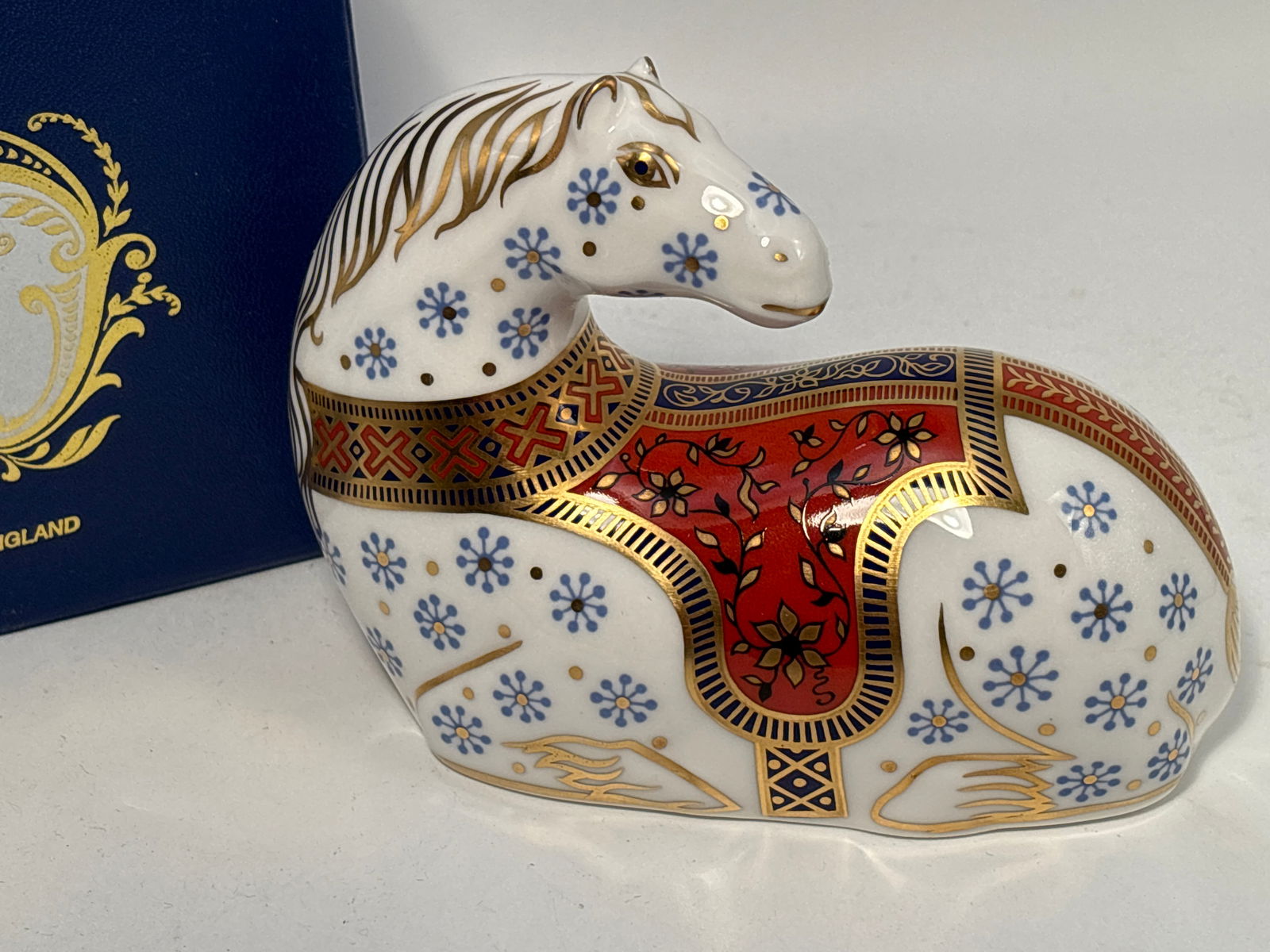 Royal Crown Derby Imari Horse English fine china 5inch paperweight statue: Imari Horse Royal Crown Derby England 4&3/4 inch paperweight statue. Nice hand enameled gold accents. Original box. Sikver stopper.Very good beautiful condition