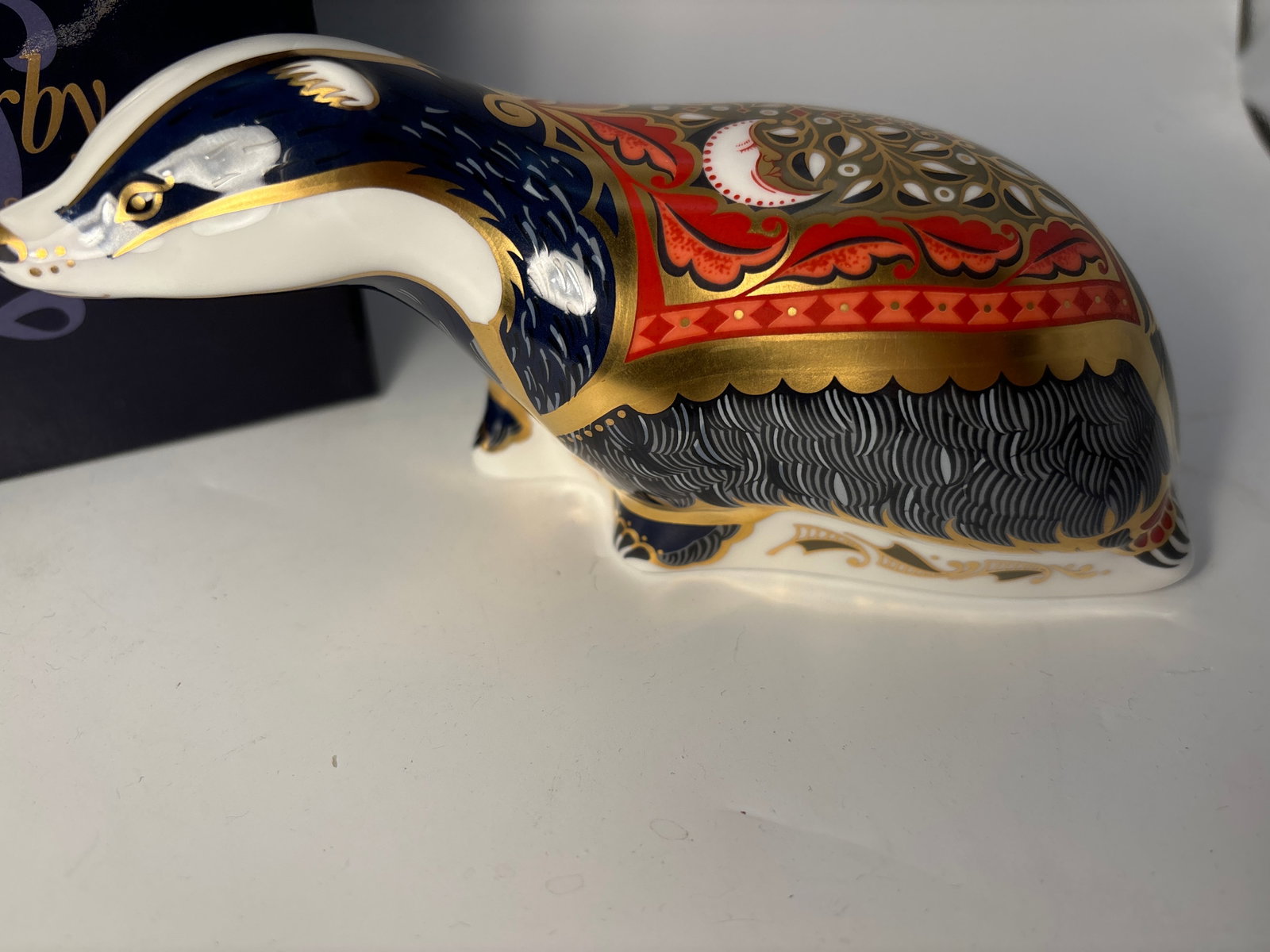 2001 Collectors Guild Moonlight Badger Royal Crown Derby English 6 inch paperweight: Unique colors 2091 Collectors Guild Moonlight Badger Royal Crown Derby English 6 inch paperweightNice hand enameled gold accents. Gold stopper. Original box. Very good beautiful condition