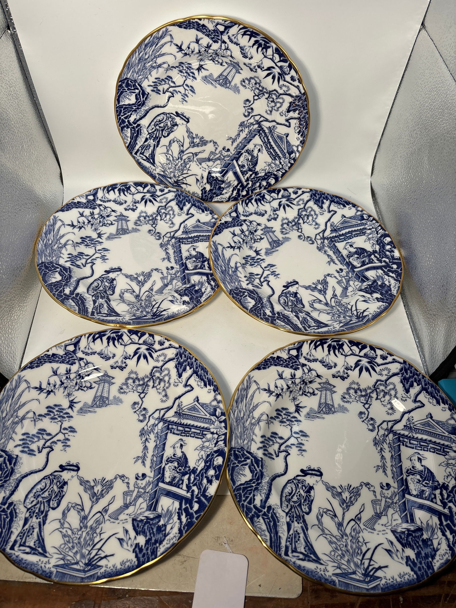 Set of five ‘Mikado’ pattern Royal Crown Derby English 8&1/2inch plates: Set of five “Mikado” pattern Royal Crown Derby English 8&1/2inch plates. Nice blue transfer scene with enameled gold accents. Very good beautiful condition