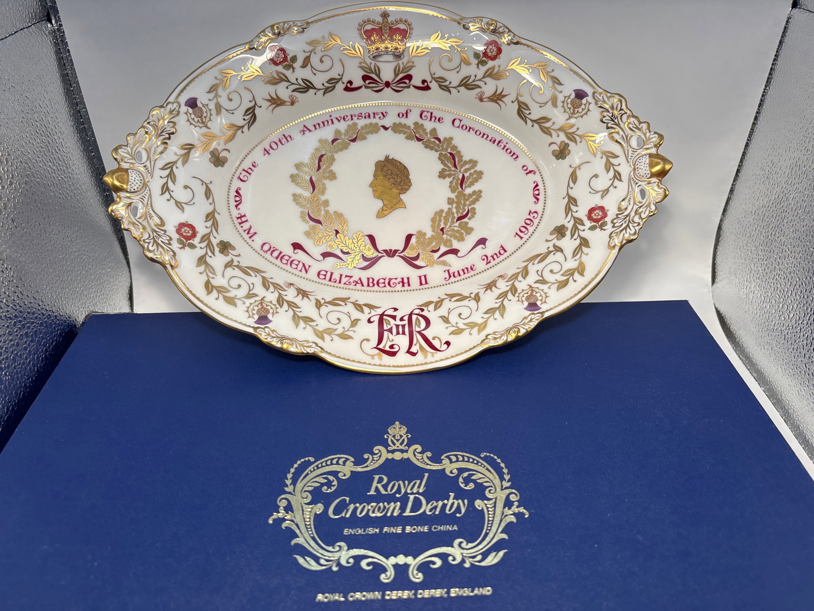 Limited ed.Govier’s 11in.Royal Crown Derby English 40th anniversary coronation Queen Elizabeth: Strikingly elegant Limited ed.Govier’s 11in.Royal Crown Derby English 40th anniversary coronation Queen Elizabeth footed centerpiece bowl. 11 inches long, 8 inches wide by 1&1/2 high. Original box.V