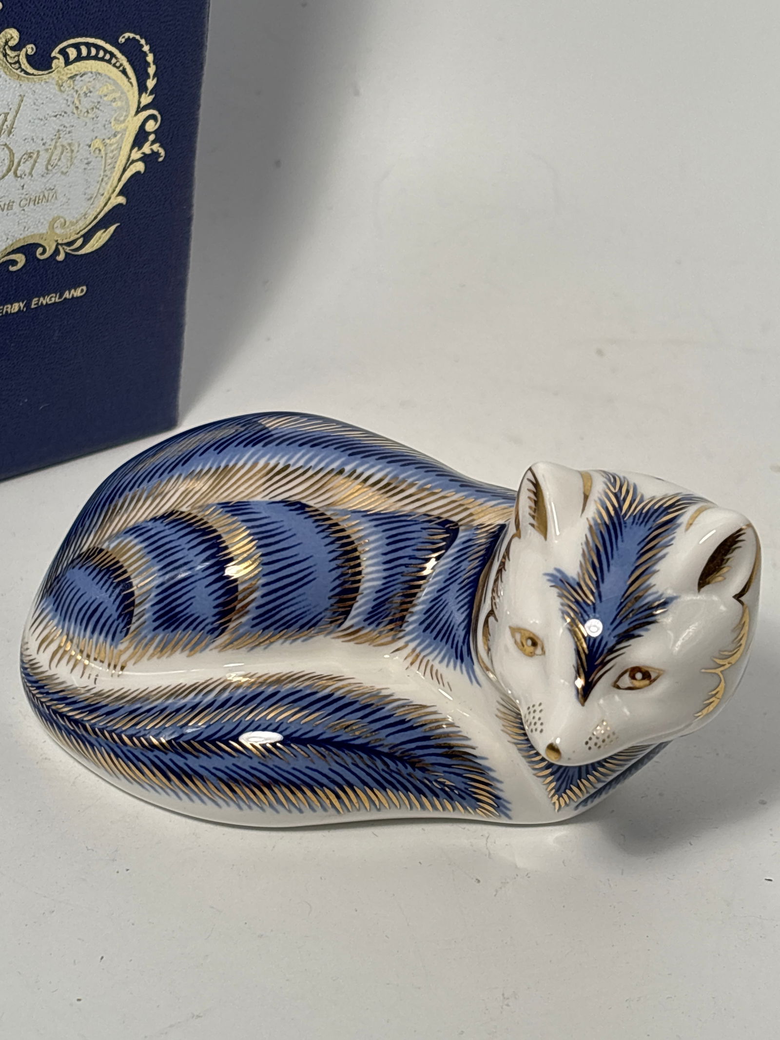 Blue ‘Artic Fox’ Royal Crown Derby 4 inch paperweight: Blue fox Royal Crown Derby 4 inch paperweight . Original box. No stopper.Very good condition