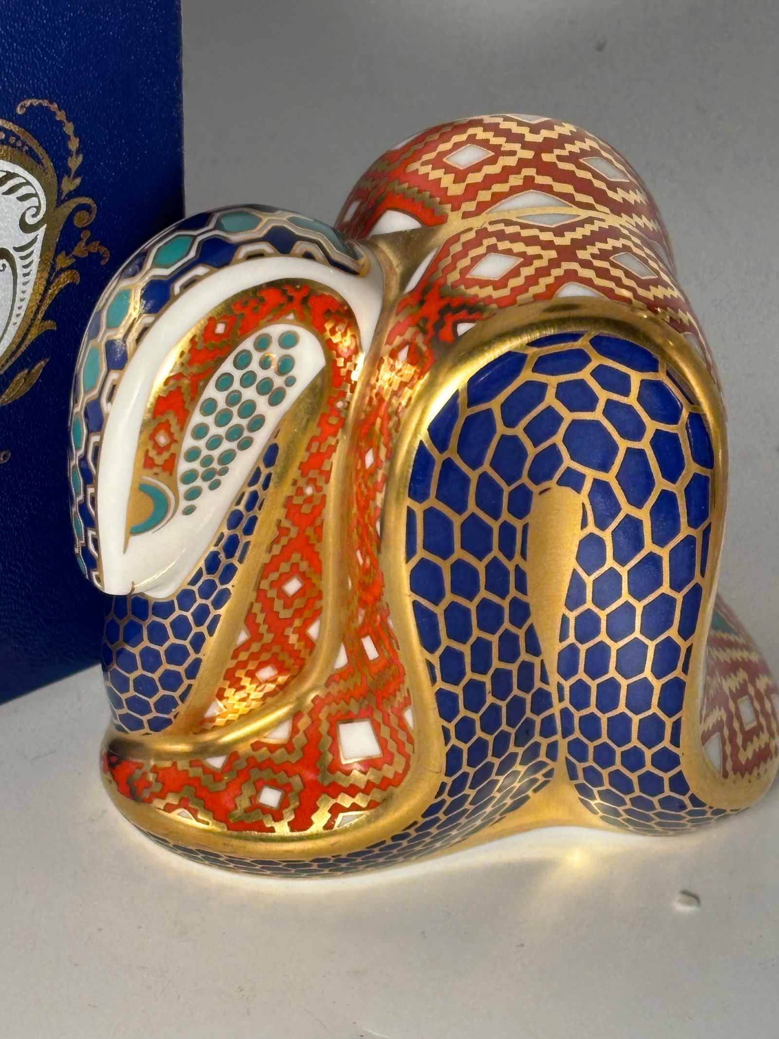 Snake/serpent Royal Crown Derby English fine china 4&14inch paperweight: Snake/serpent Royal Crown Derby English fine china 4&14inch paperweight Statue. Silver stopper. Original box.Very good condition with no chips, cracks, lines, etc.