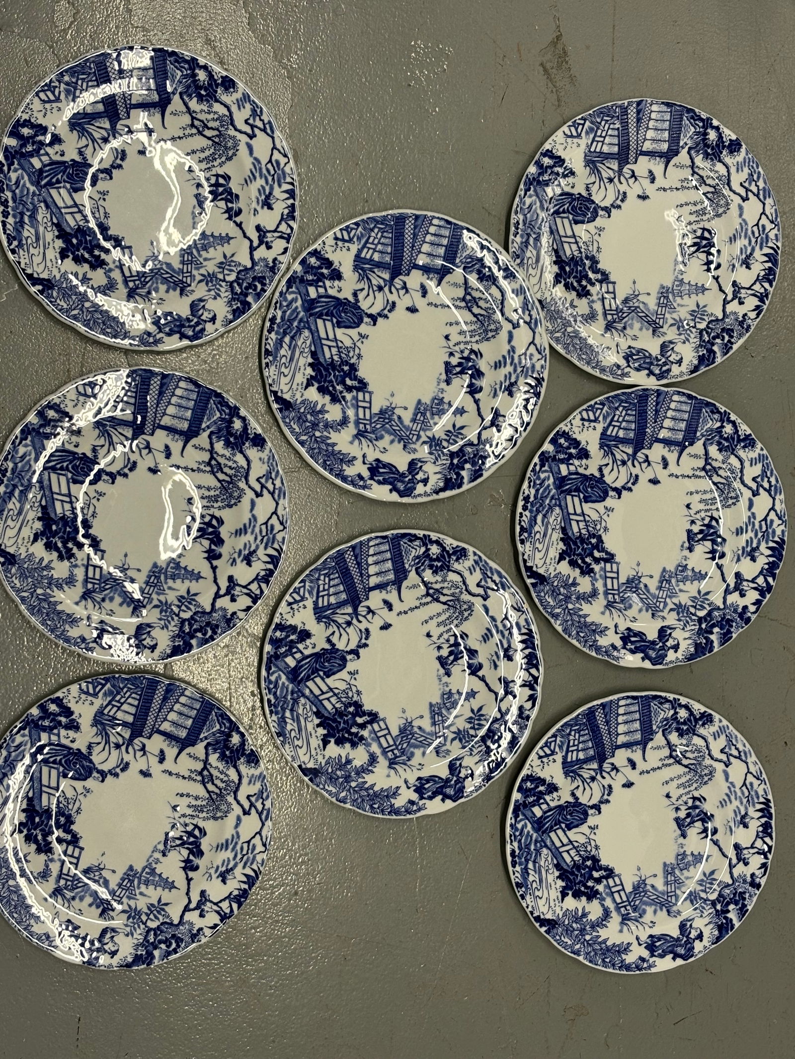 Set of eight Mikado pattern unsigned Royal Crown Derby England 8&1/2 inch plates: Set of eight Mikado pattern unsigned Royal Crown Derby England 8&1/2 inch plates.Really great colors and great condition. Apparently all unsigned.Very good condition, no chips, cracks, etc.