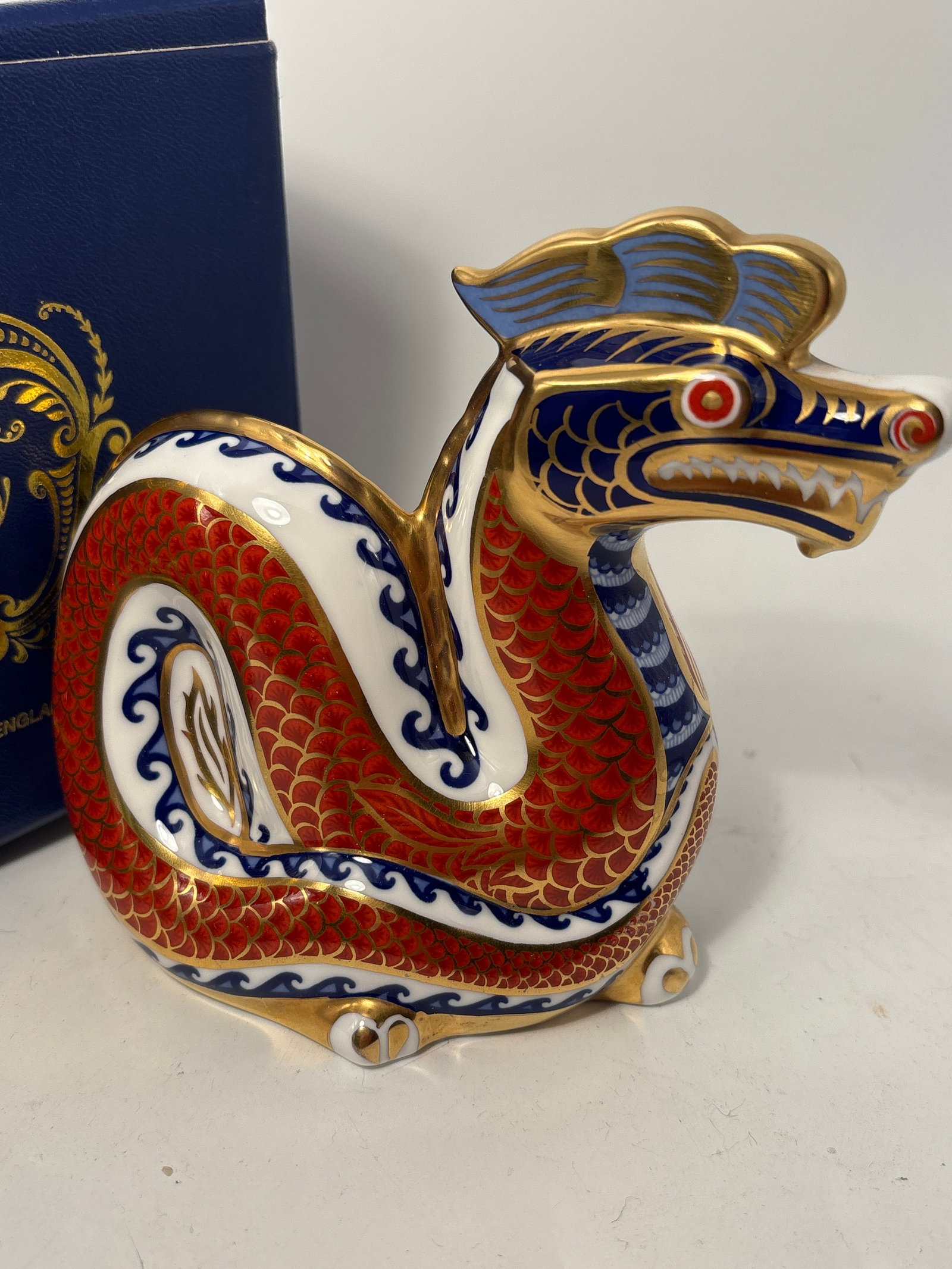 Imari Dragon form Royal Crown Derby 5x5 inch paperweight statue: Imari Dragon form Royal Crown Derby 5x5inch paperweight statue. Original box. Silver stopper.Very good condition, no chips, cracks, etc.