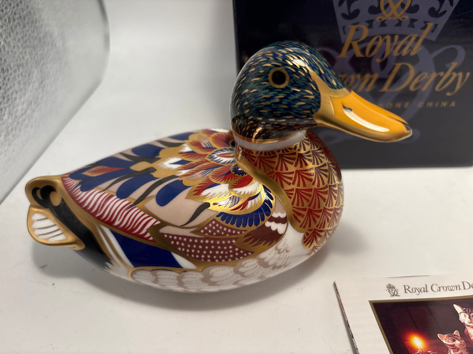 Lovely Mallard duck Royal Crown Derby fine China 5&1/2inch paperweight: Mallard Royal Crown Derby fine China 5&1/2inch paperweight . Gold stopper. Original box.Very good condition, no chips, cracks, etc.