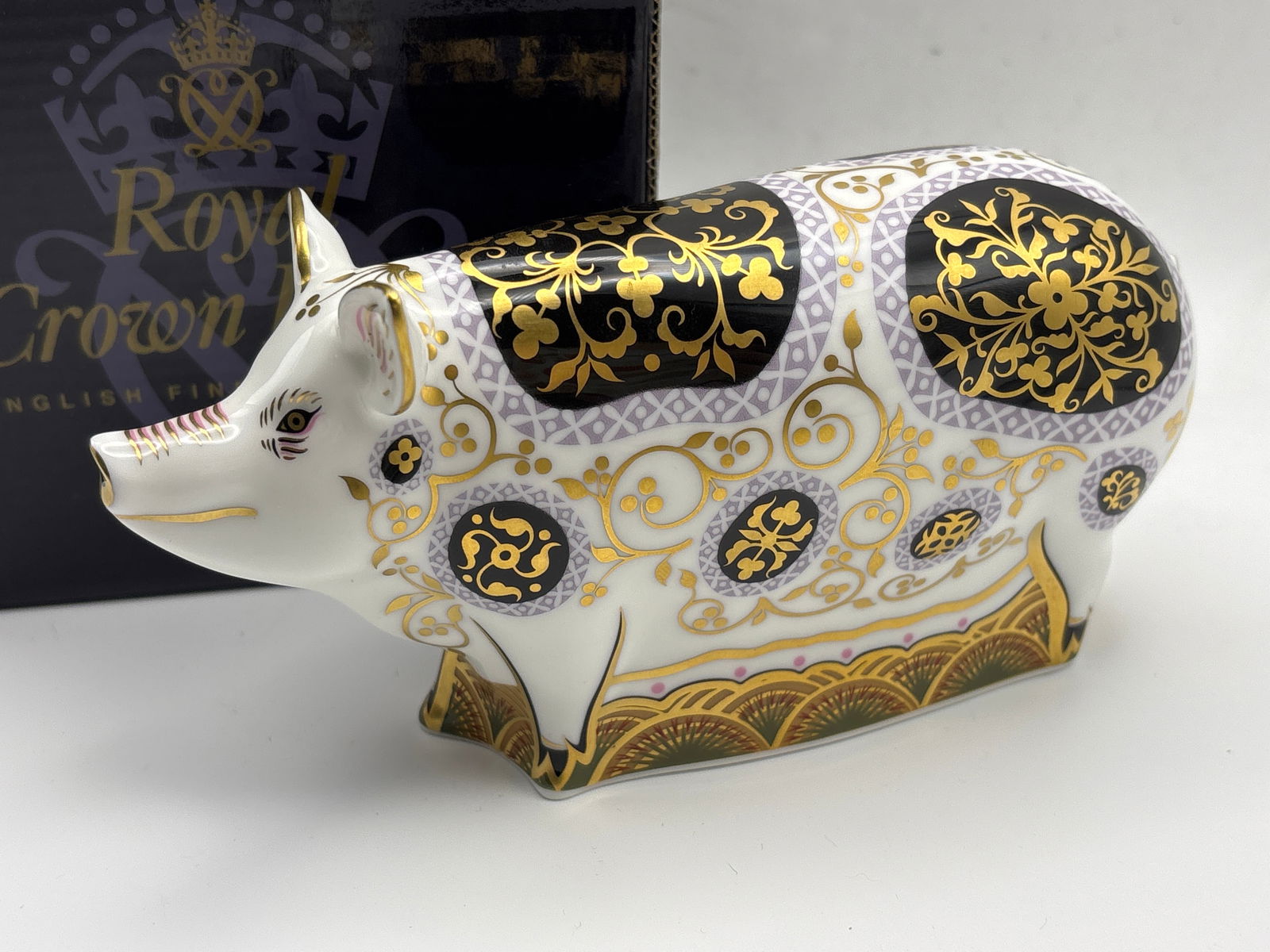 Spotty Pig limited edition Royal Crown Derby England Paperweight, 6inch long: Royal Crown Derby fine English “Spotty Pig” Paperweight.It has gold stopper and comes in a box.It measures approximately 6 “long.